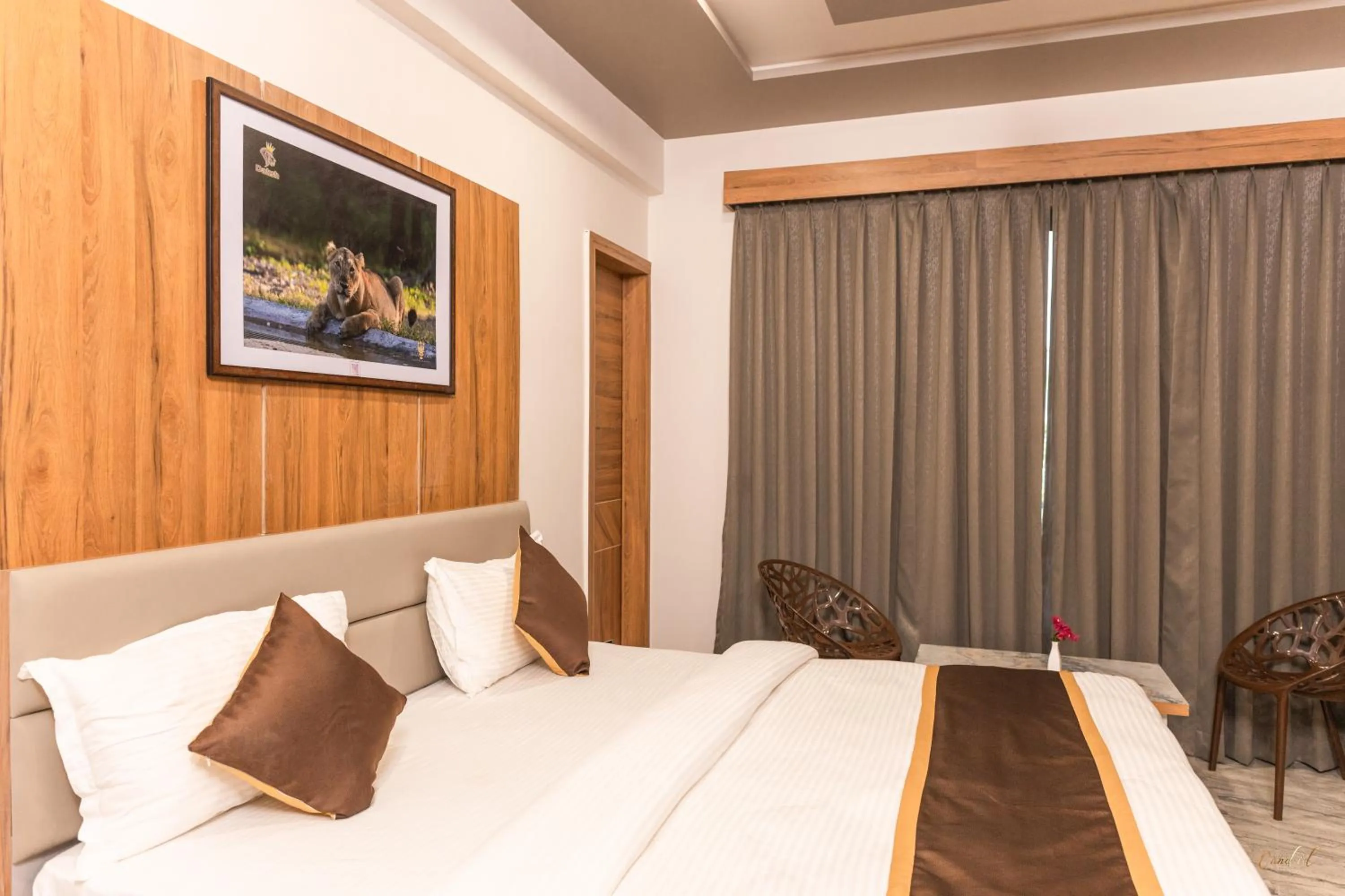 Bedroom in Daksh Eden Greenz -A Luxury Resort in Sasan Gir