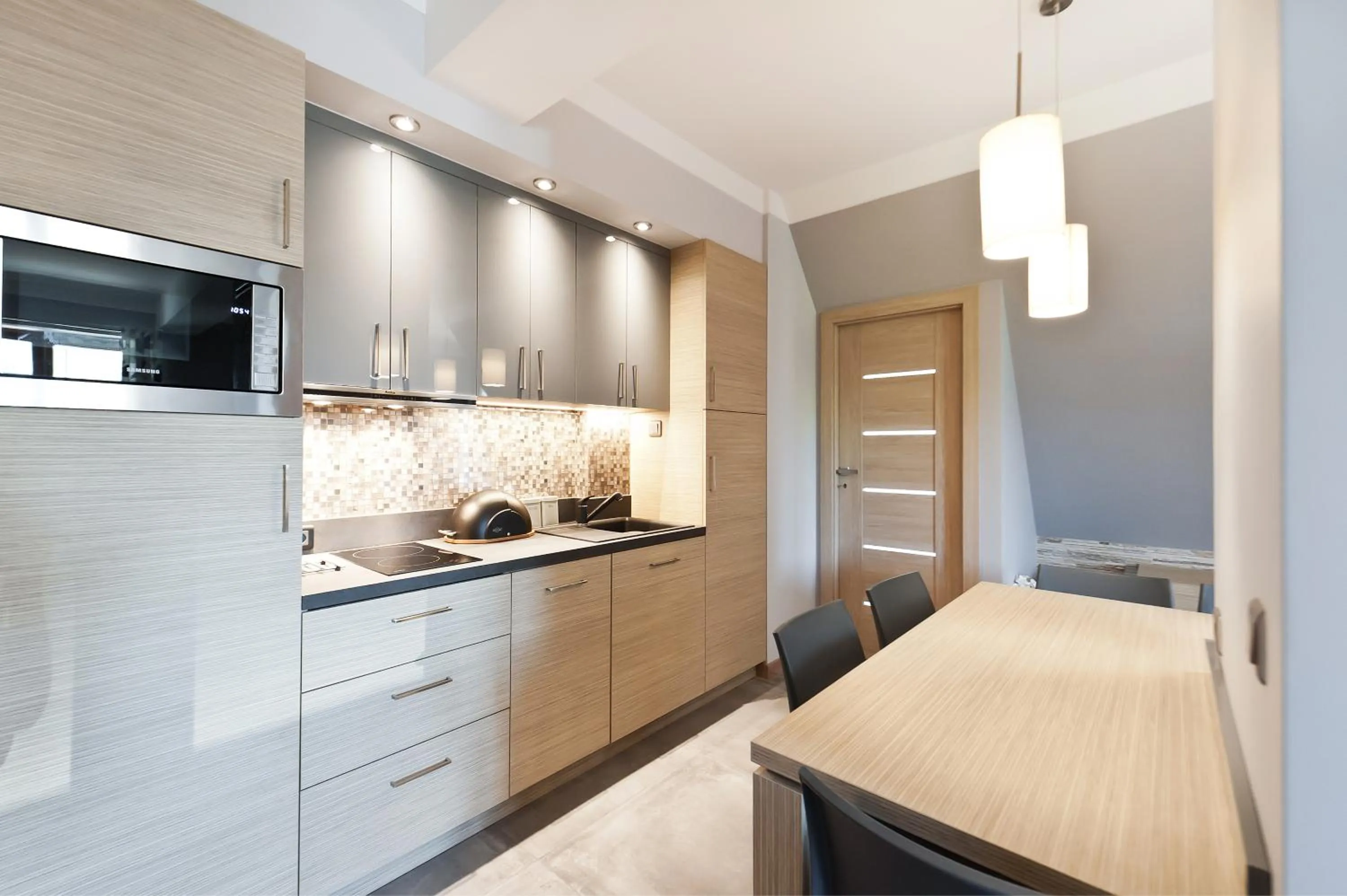 Kitchen or kitchenette in Apartamenty Lipki Park, Sun & Snow