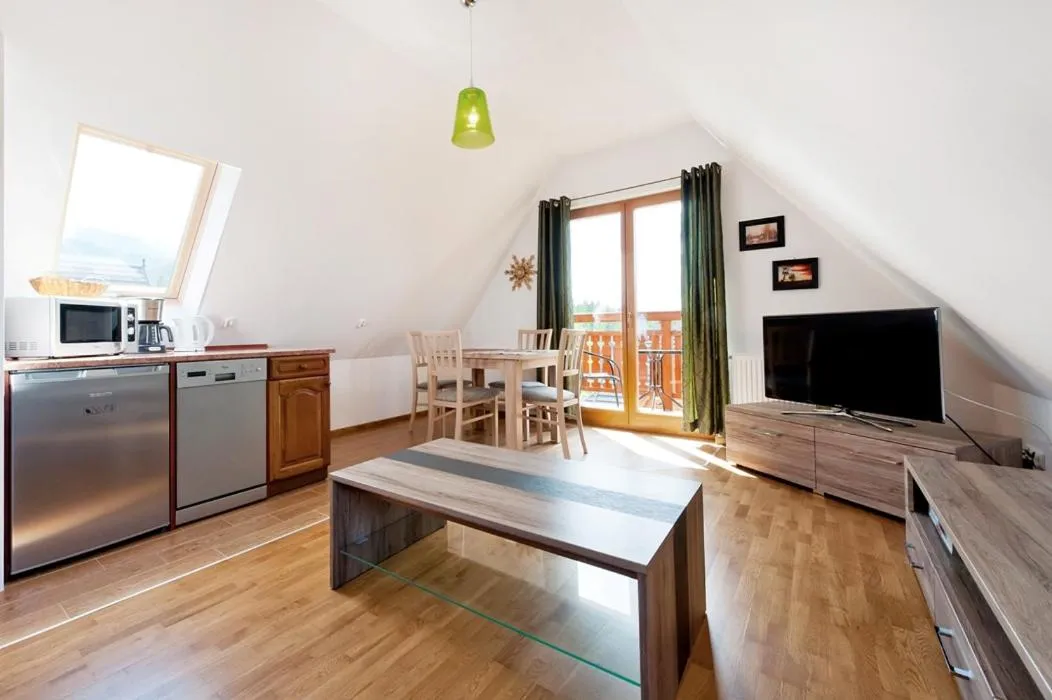 Kitchen or kitchenette in Apartamenty Lipki Park, Sun & Snow