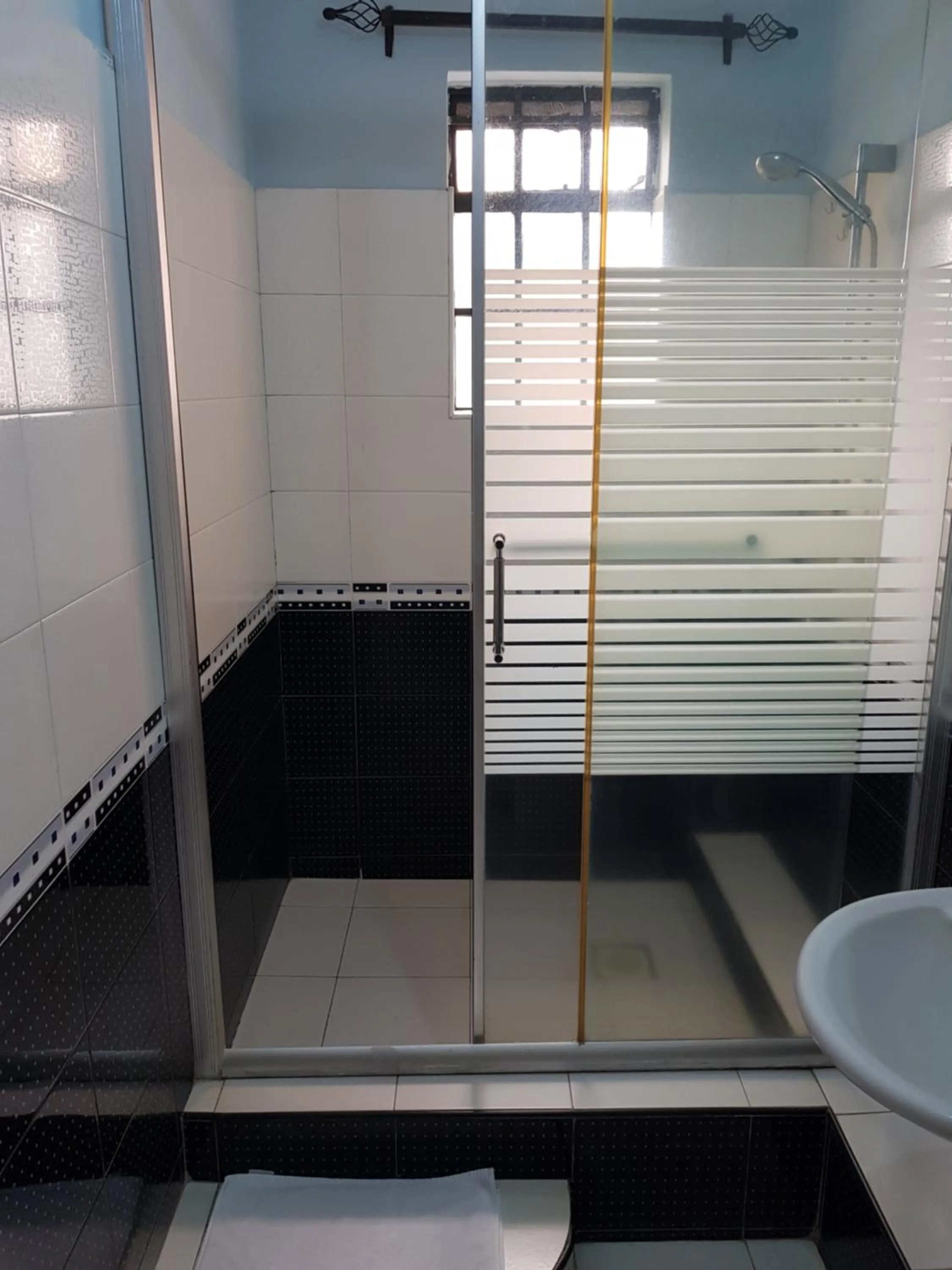 Shower in Natural Oak Apartments