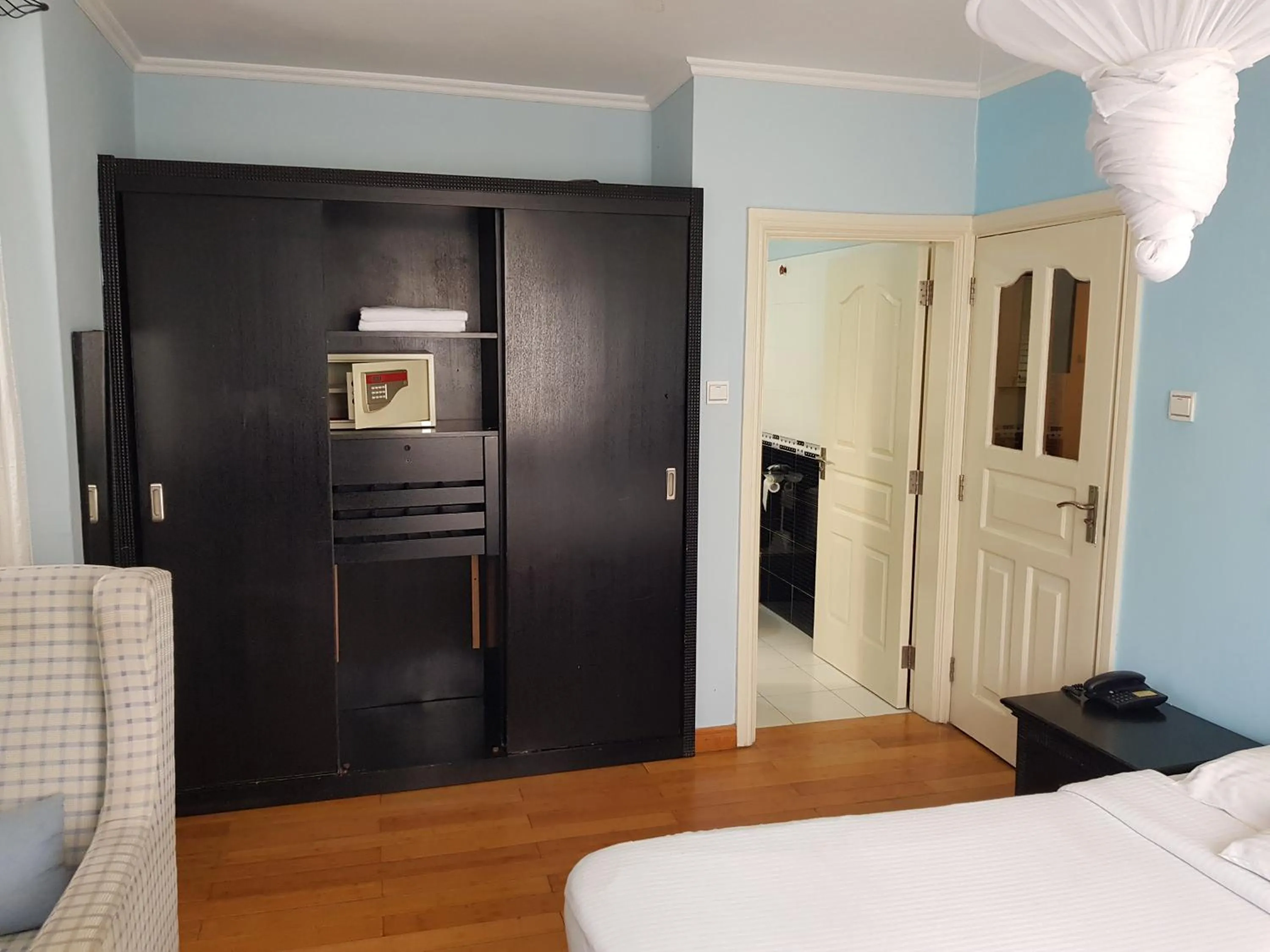 Bed in Natural Oak Apartments