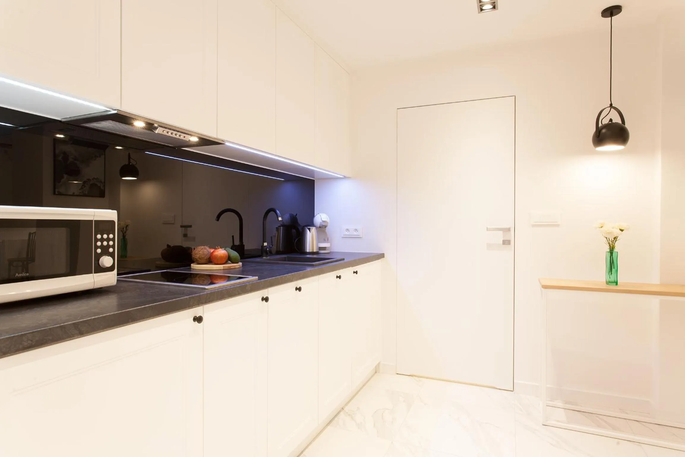 Kitchen or kitchenette in MINT Luxury Apartments at the Main Square