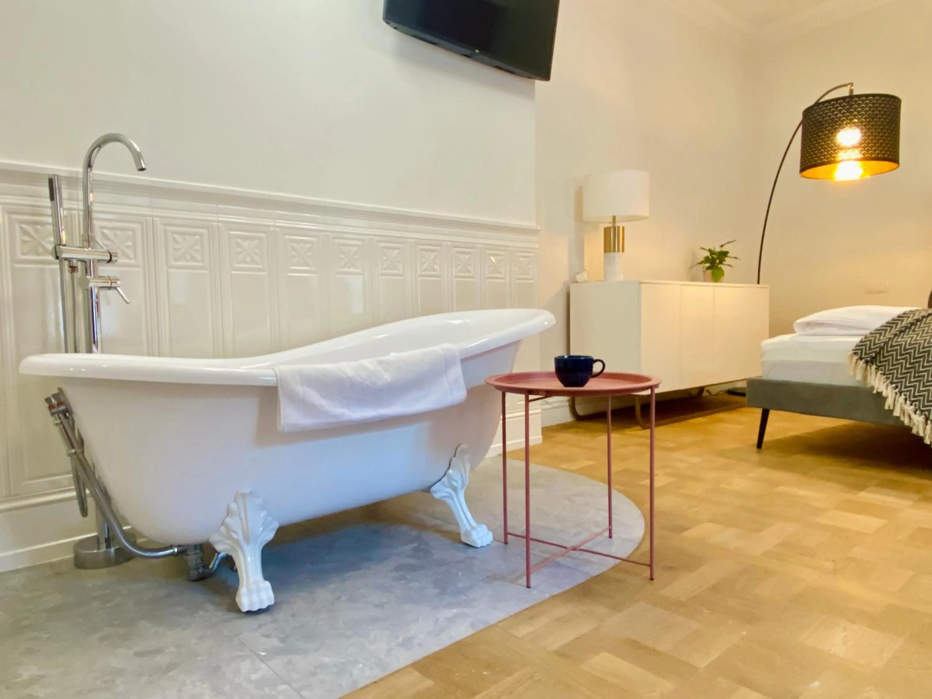 Bed in MINT Luxury Apartments at the Main Square