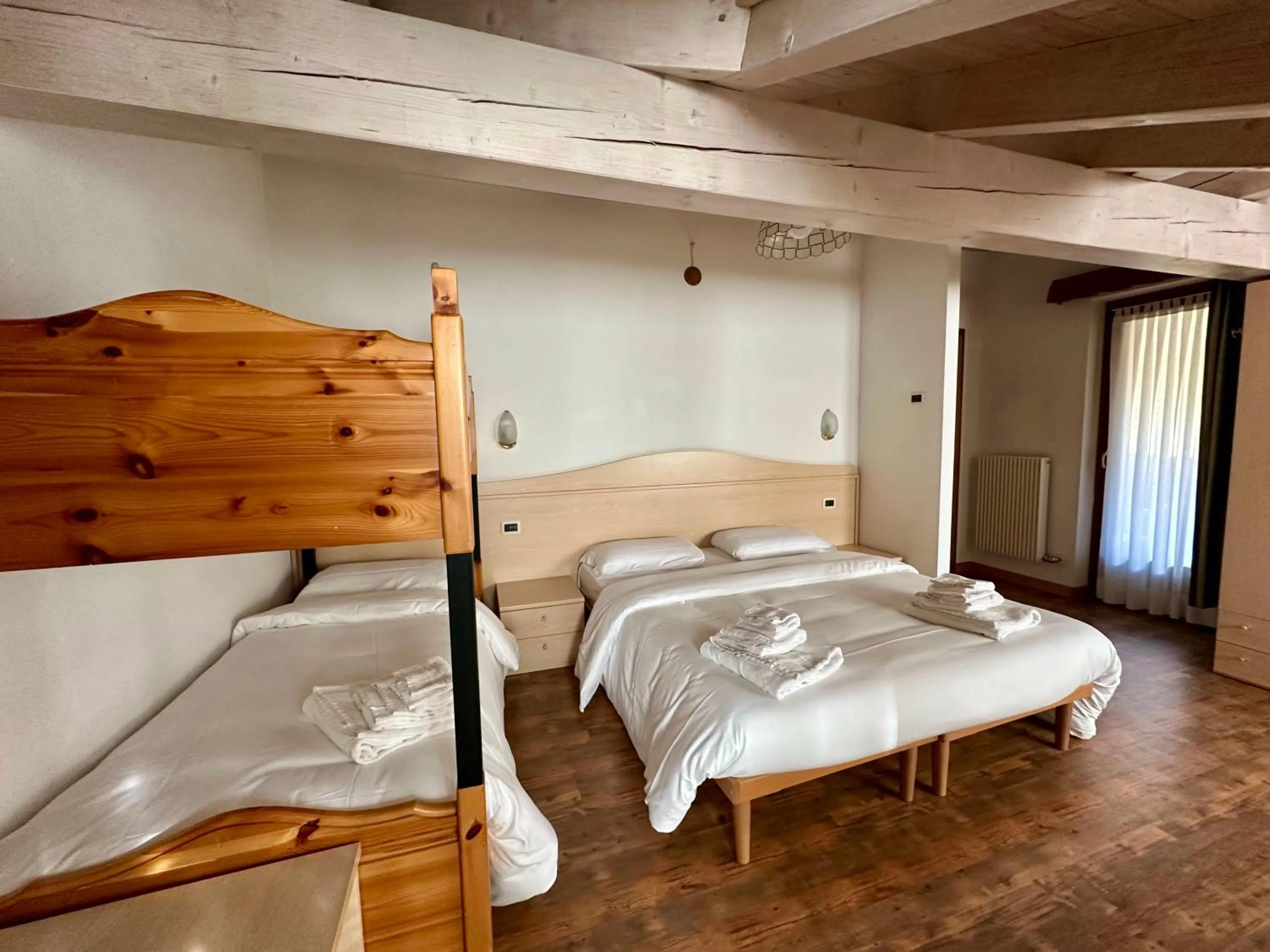 Bed in Hotel Garnì Maffei