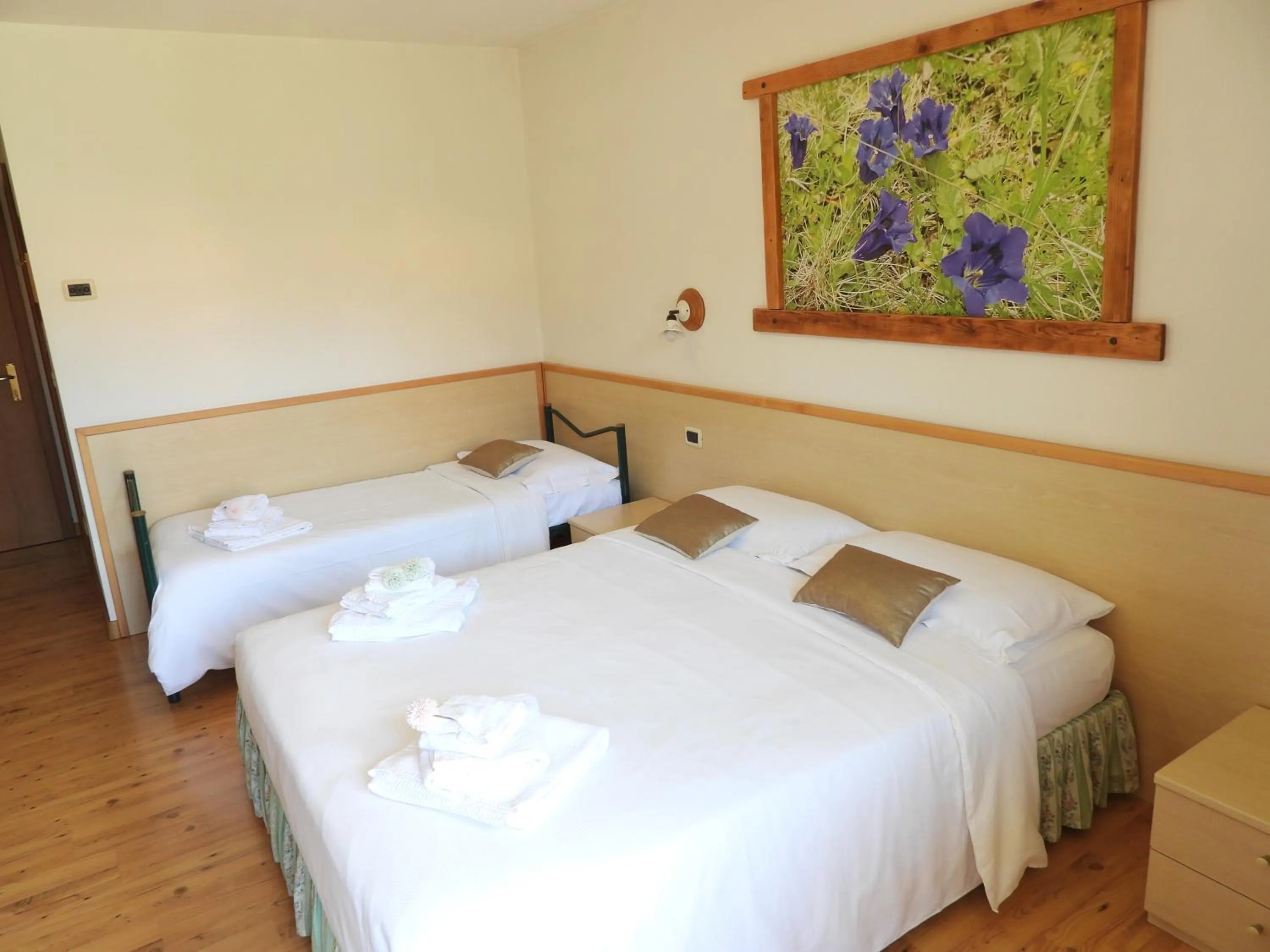 Bed in Hotel Garnì Maffei