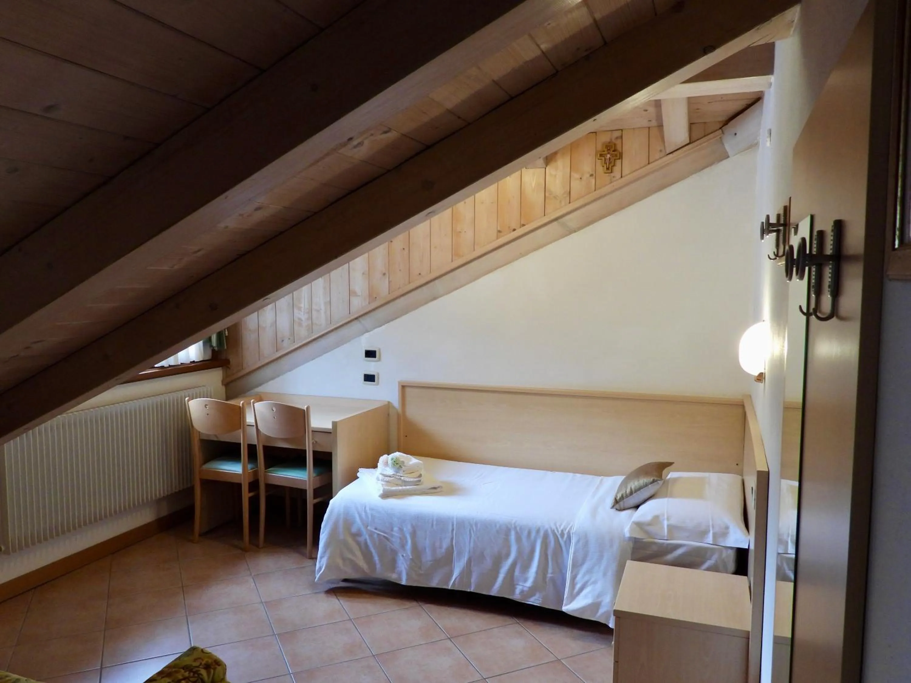 Bed in Hotel Garnì Maffei