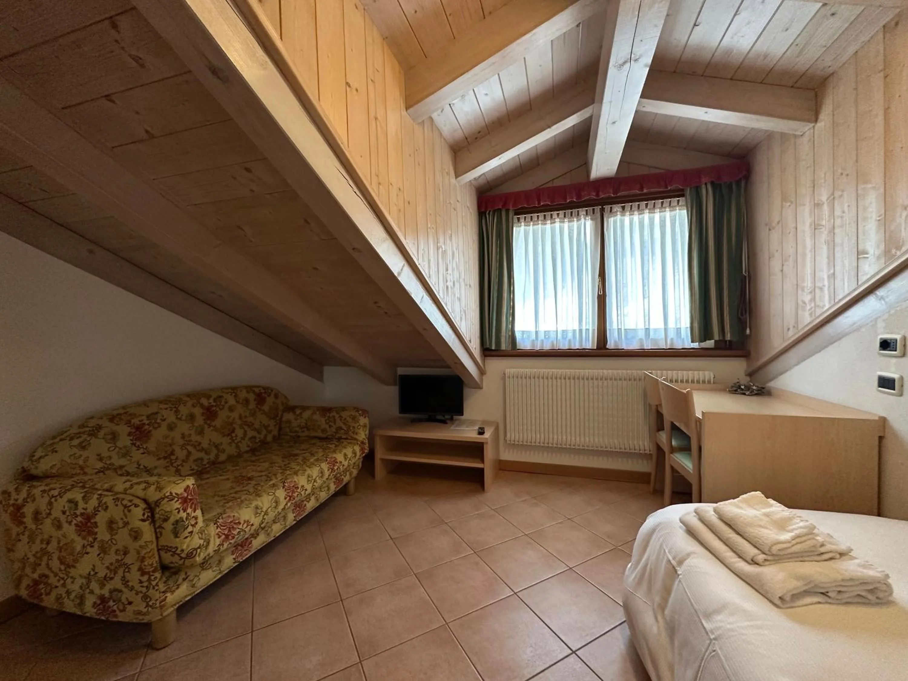 Bed in Hotel Garnì Maffei