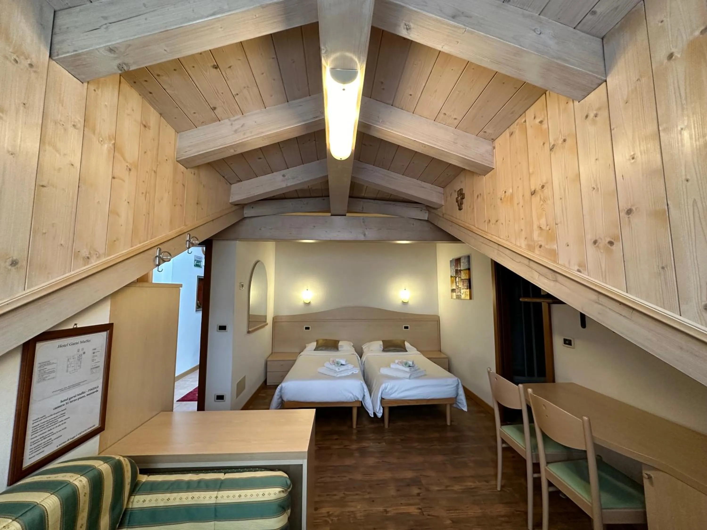 Bed in Hotel Garnì Maffei