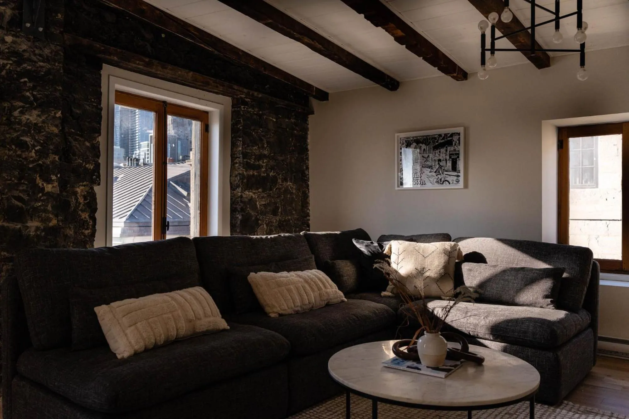 Living room in Maison Place Royale by Luxury In Transit