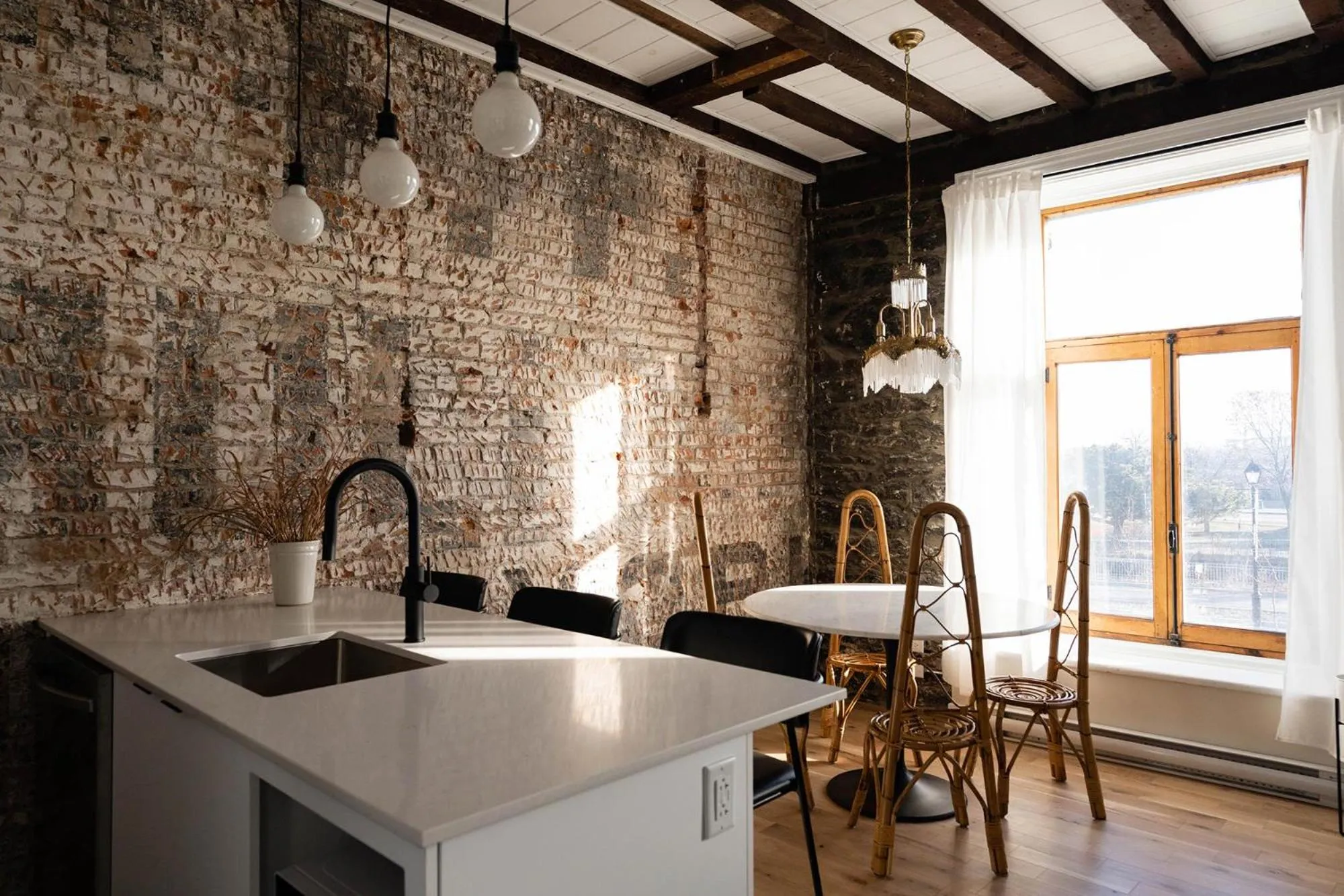 Kitchen or kitchenette in Maison Place Royale by Luxury In Transit