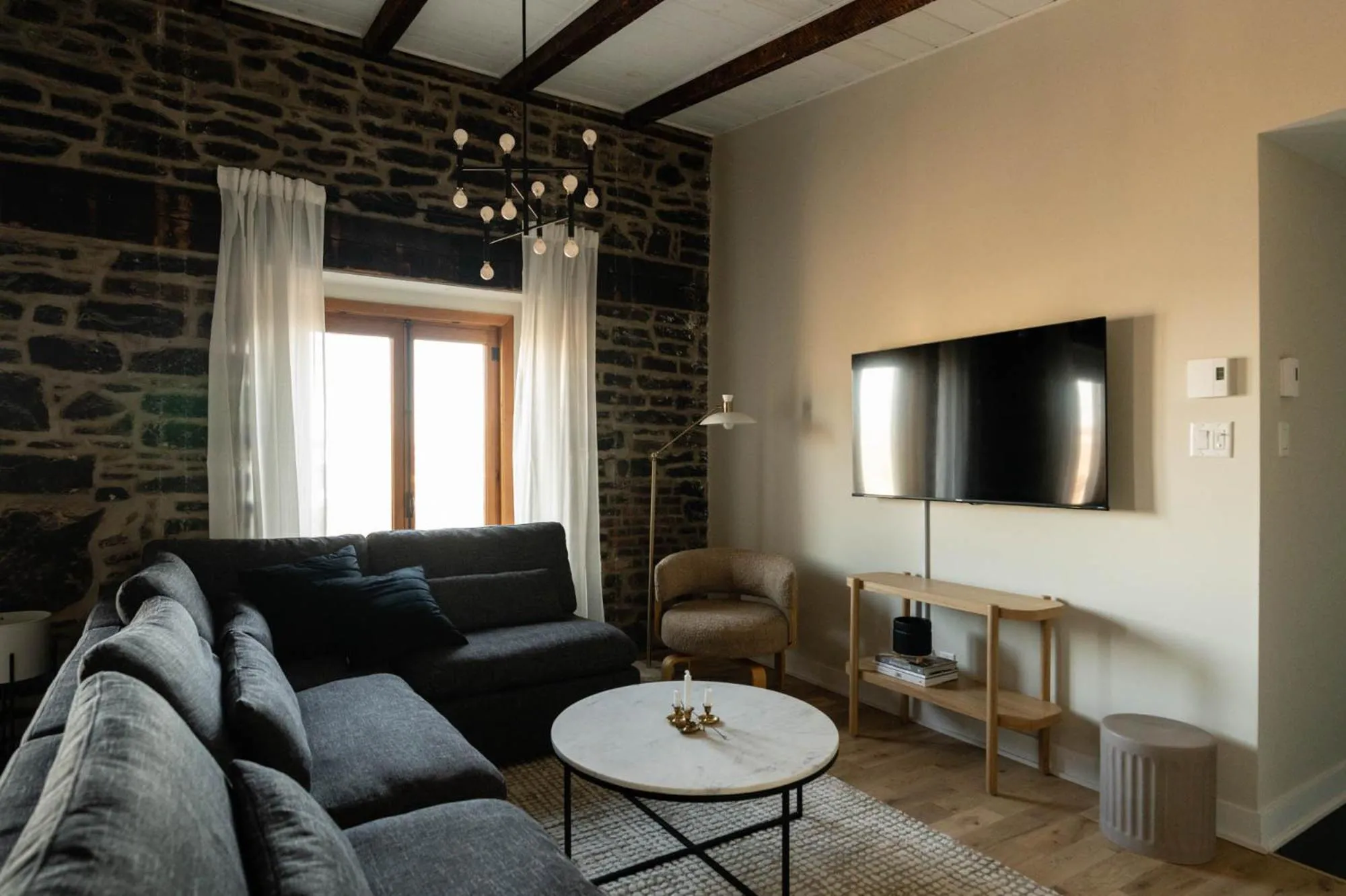TV and multimedia in Maison Place Royale by Luxury In Transit