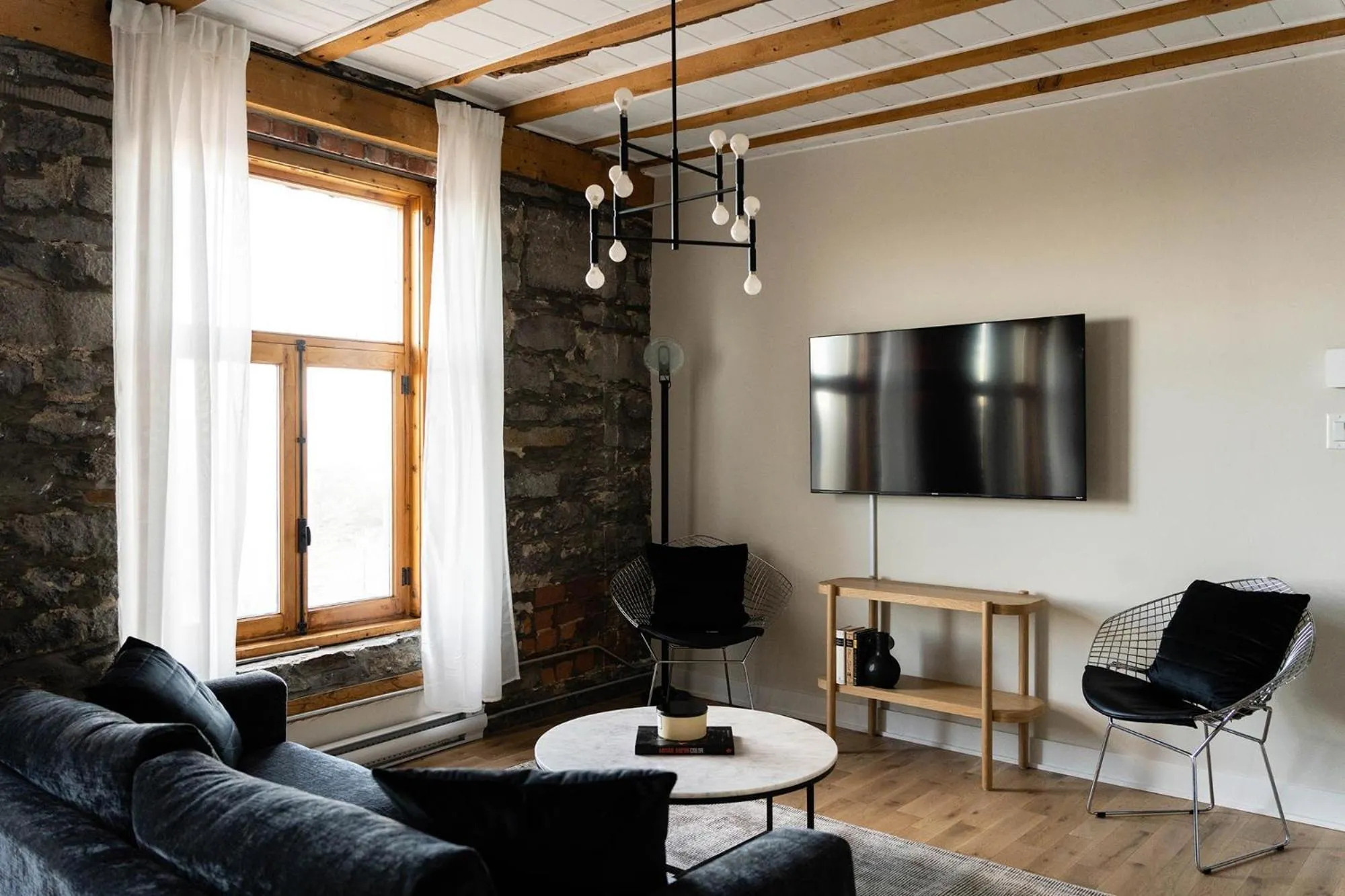 TV and multimedia in Maison Place Royale by Luxury In Transit