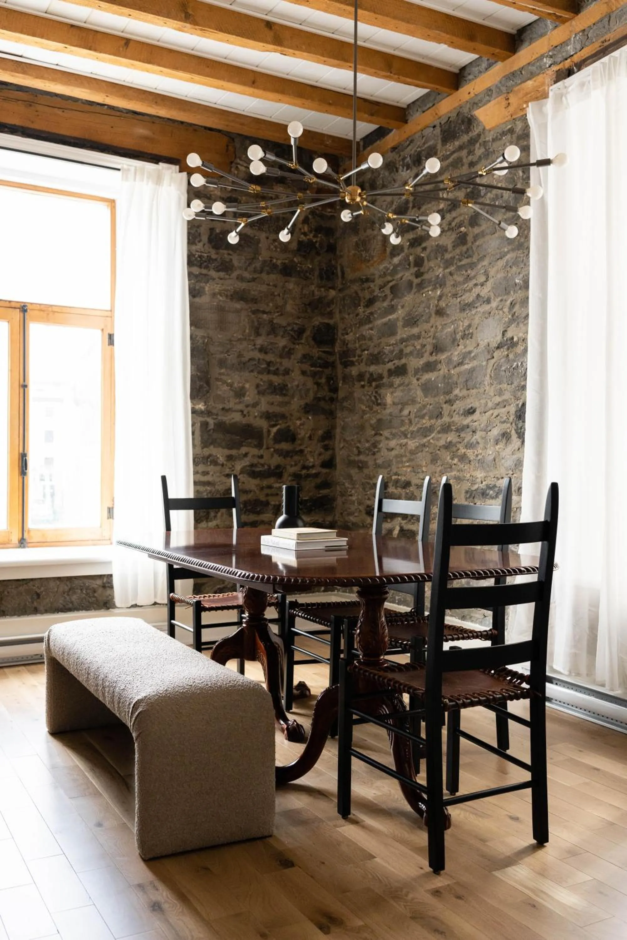 Seating area in Maison Place Royale by Luxury In Transit