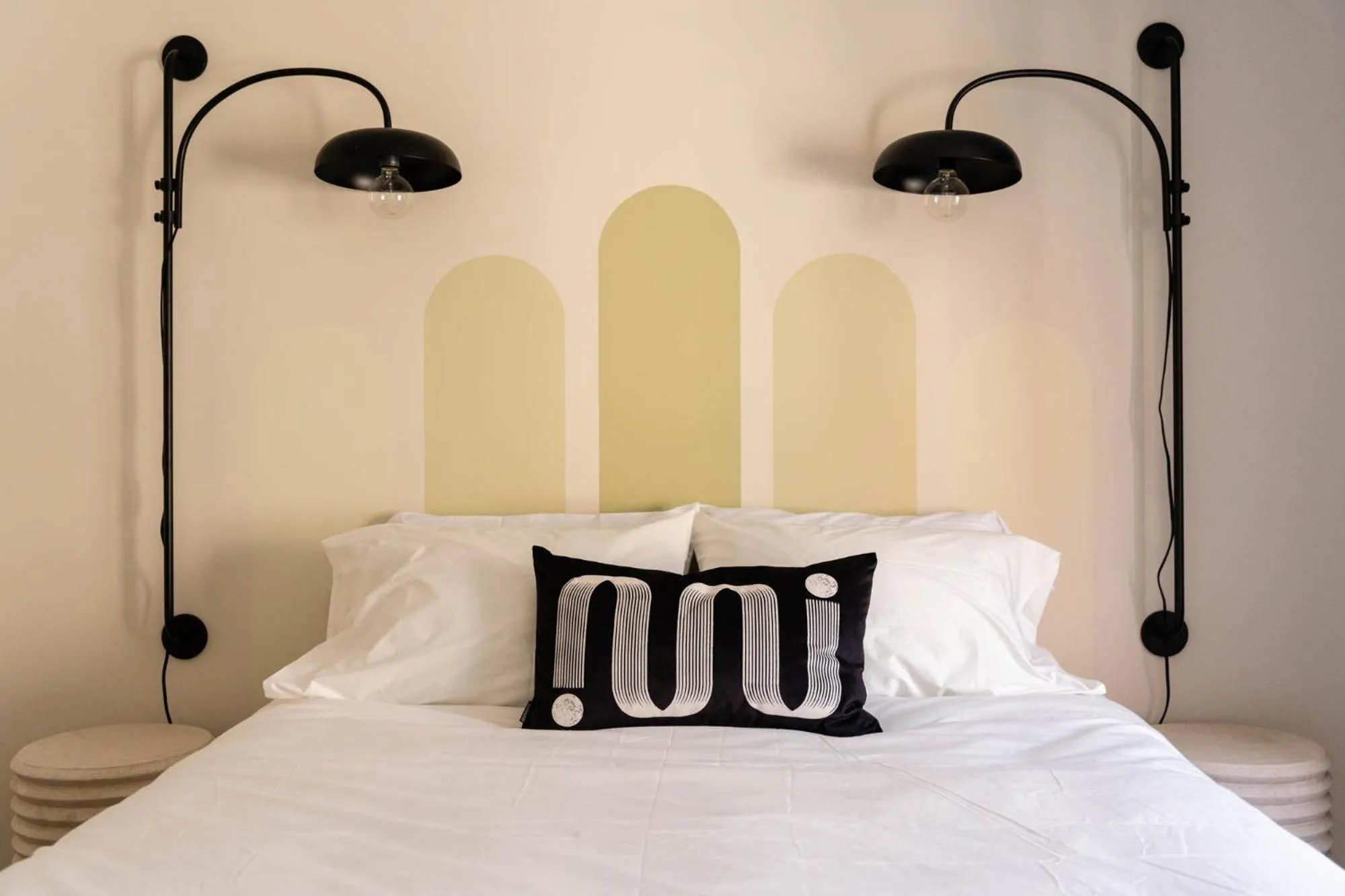 Bed in Maison Place Royale by Luxury In Transit