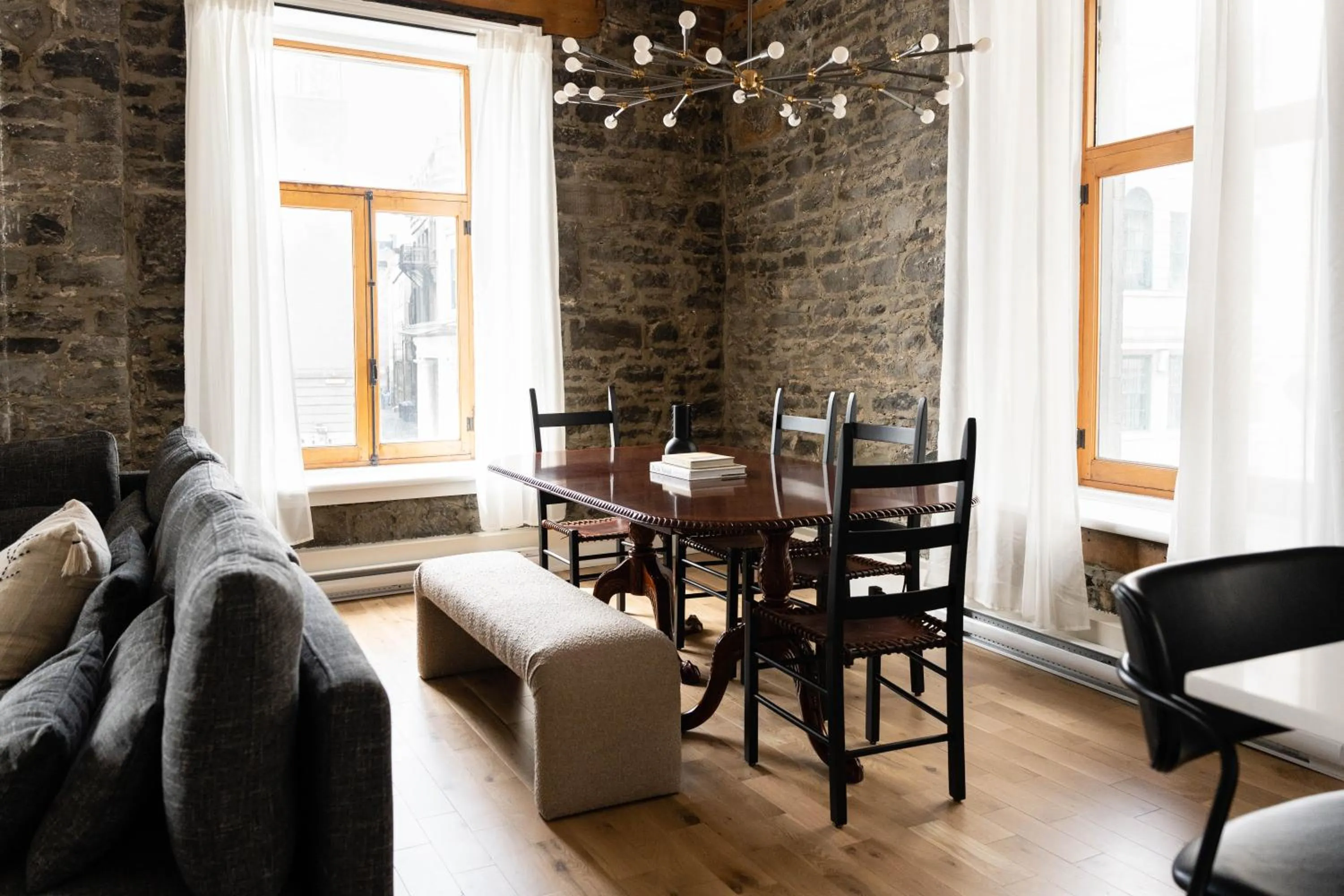 Living room in Maison Place Royale by Luxury In Transit