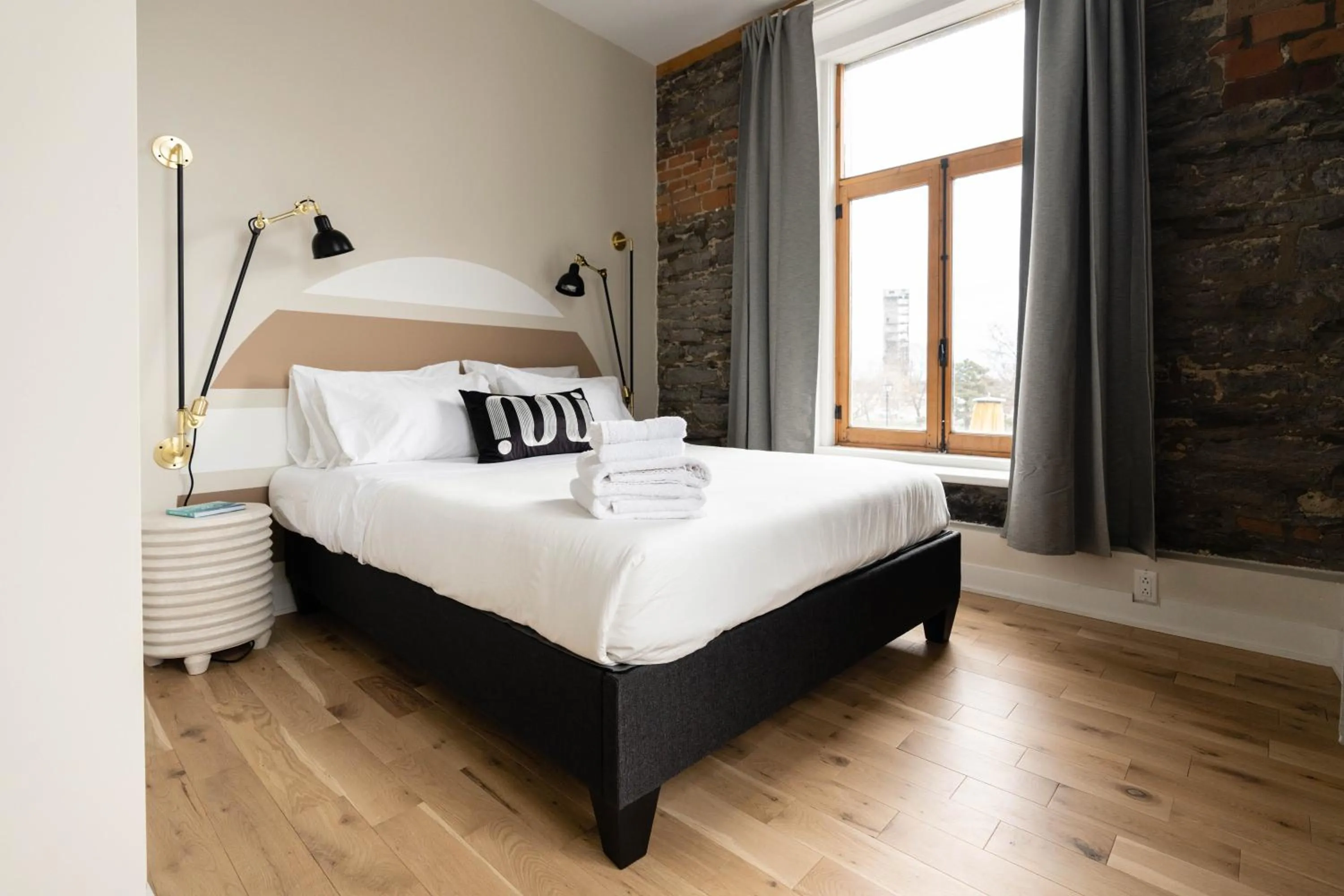 Bed in Maison Place Royale by Luxury In Transit