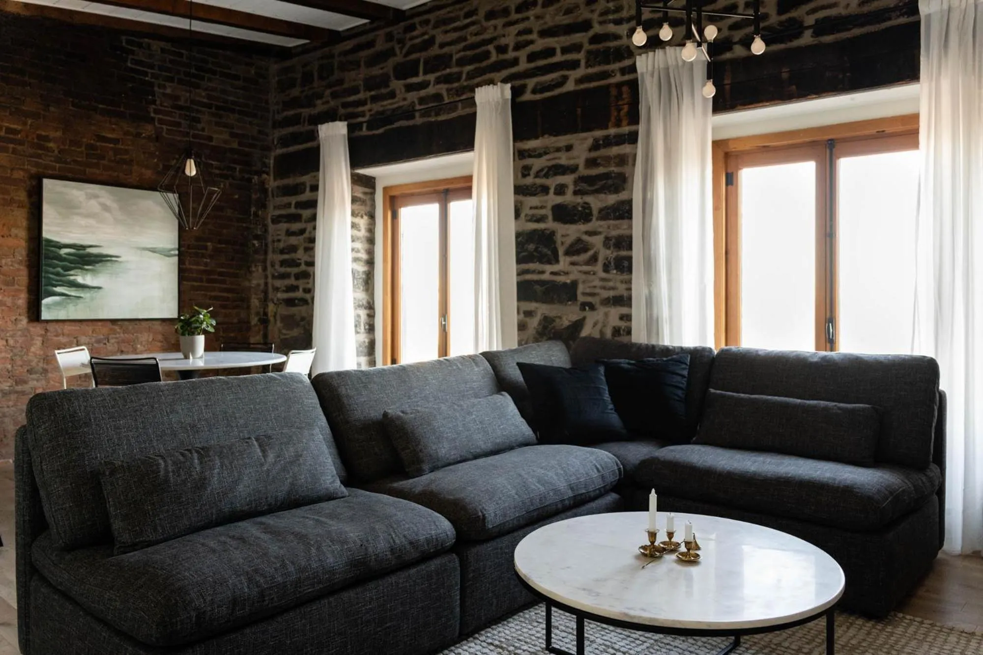 Living room in Maison Place Royale by Luxury In Transit