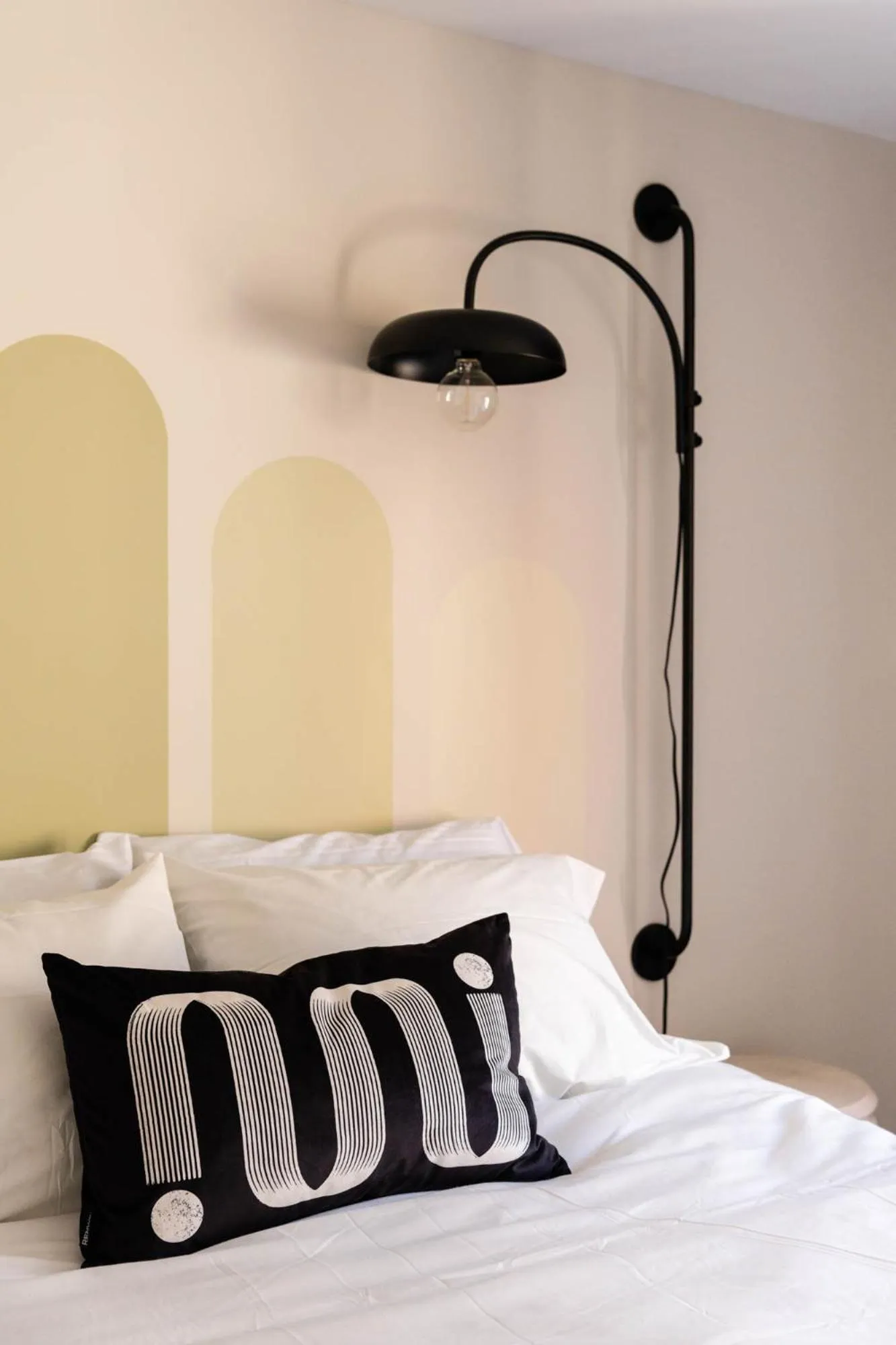 Bed in Maison Place Royale by Luxury In Transit