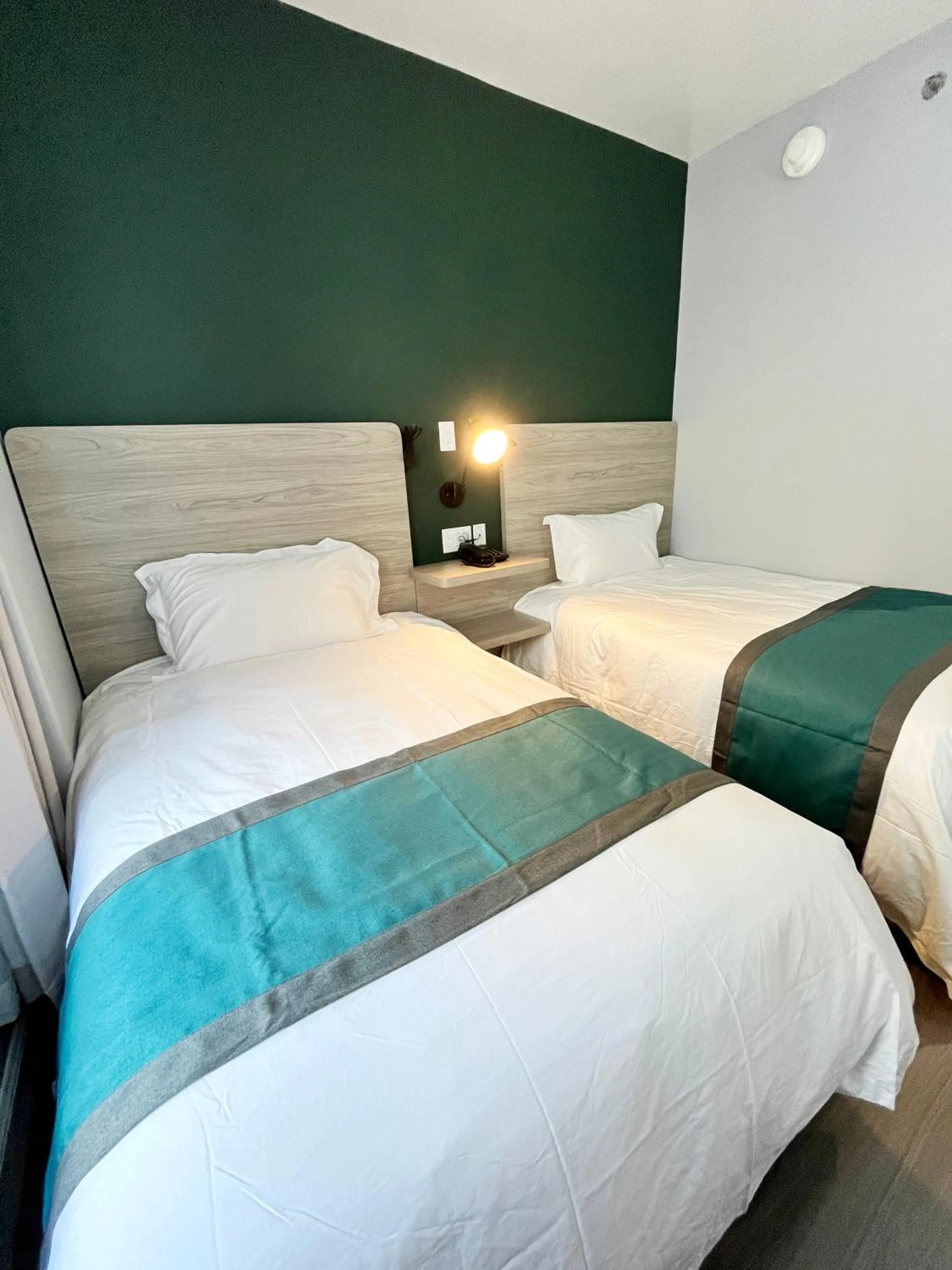 Bed in Starlight Hotel