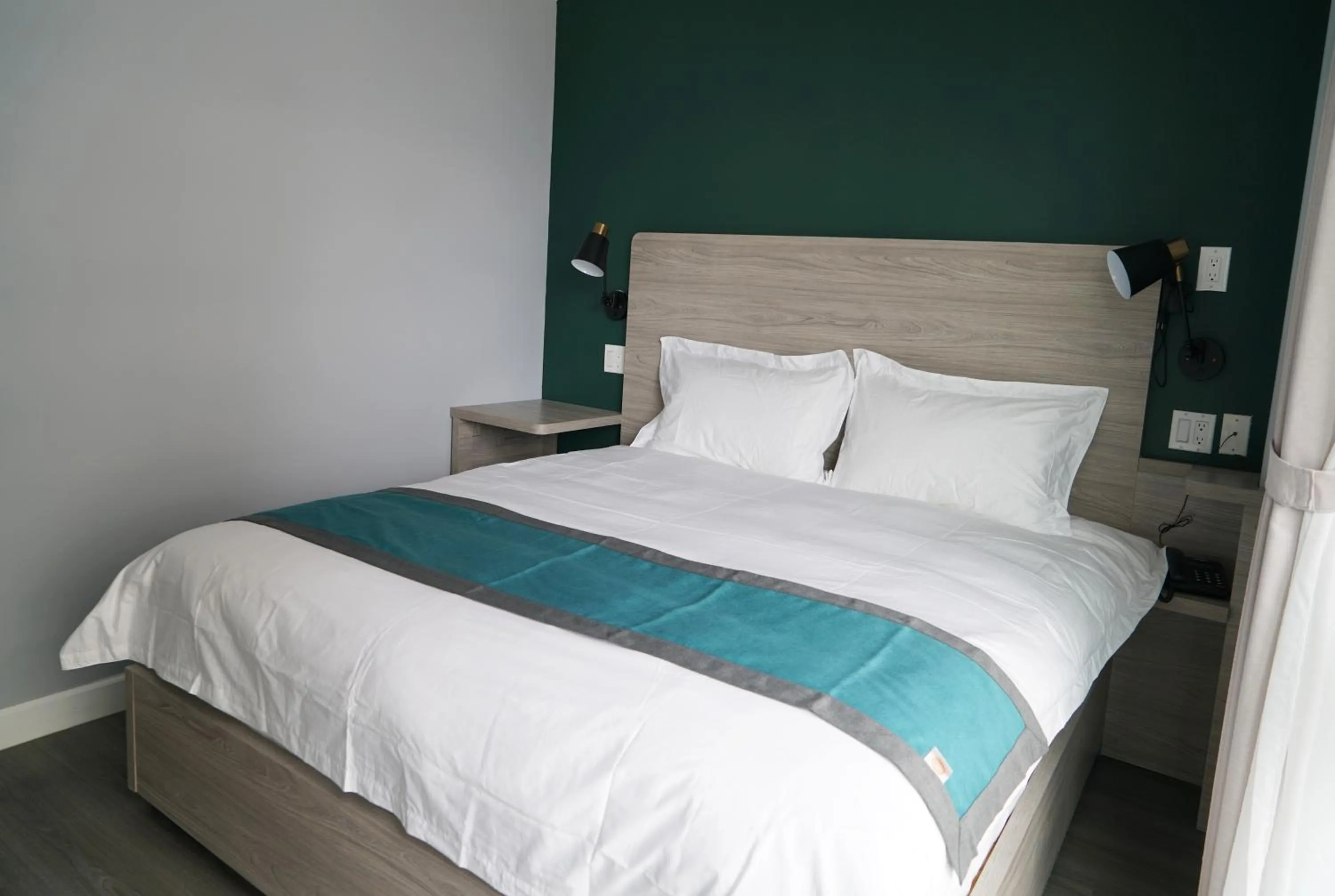 Bed in Starlight Hotel