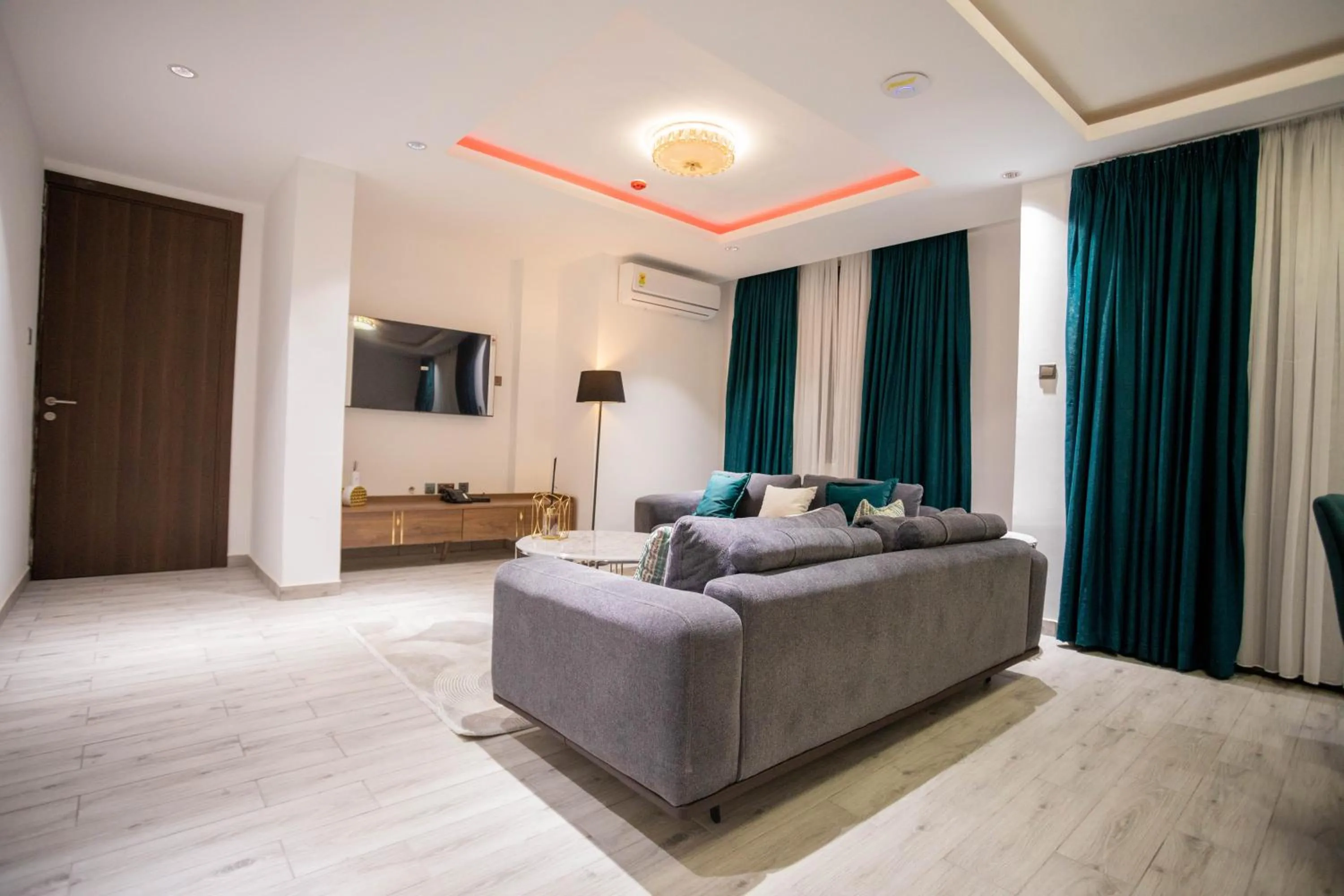 Living room, Bed in Veronique Heights