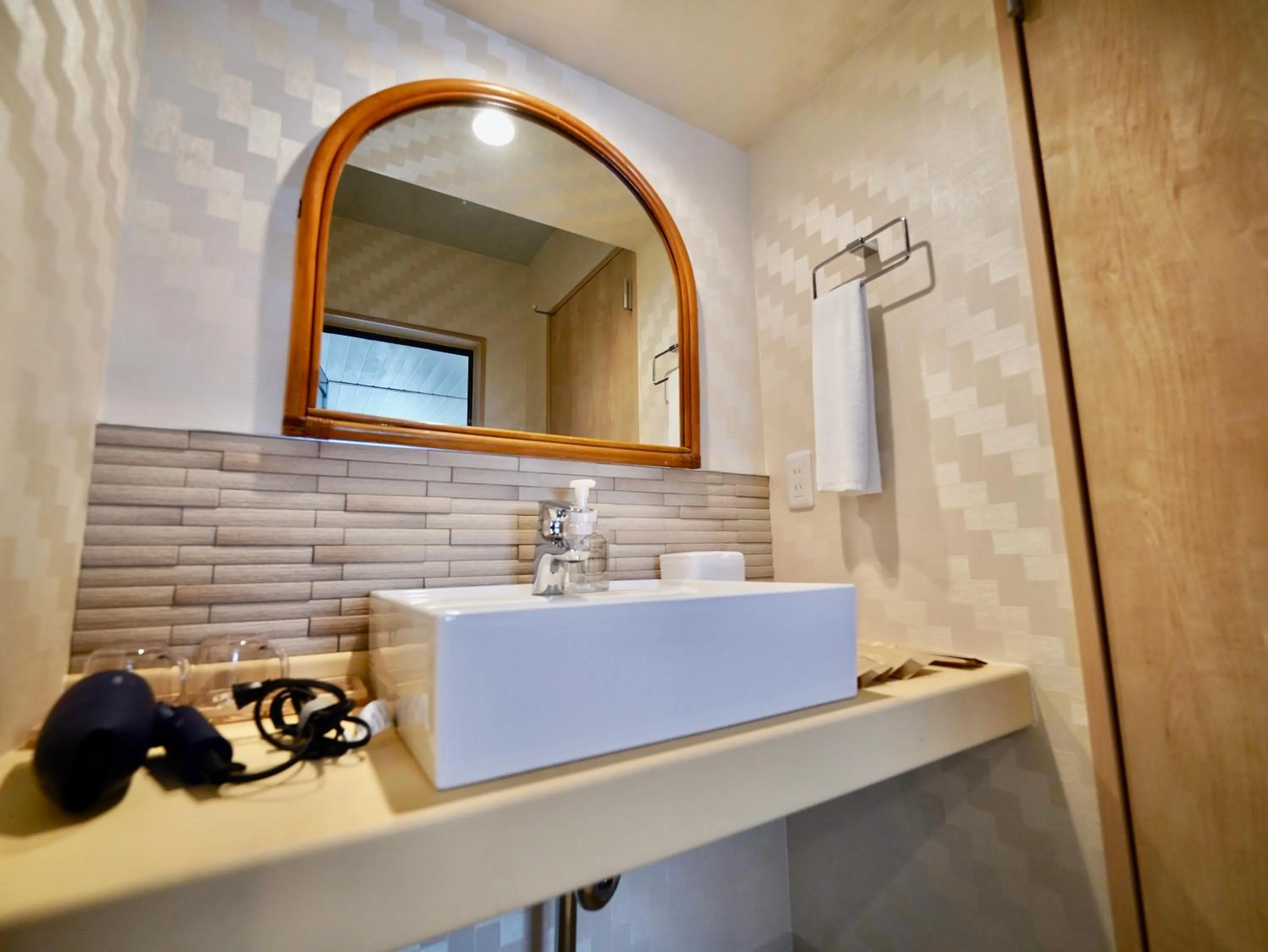 Bathroom in Hotel Ishigaki and Chikonkiya