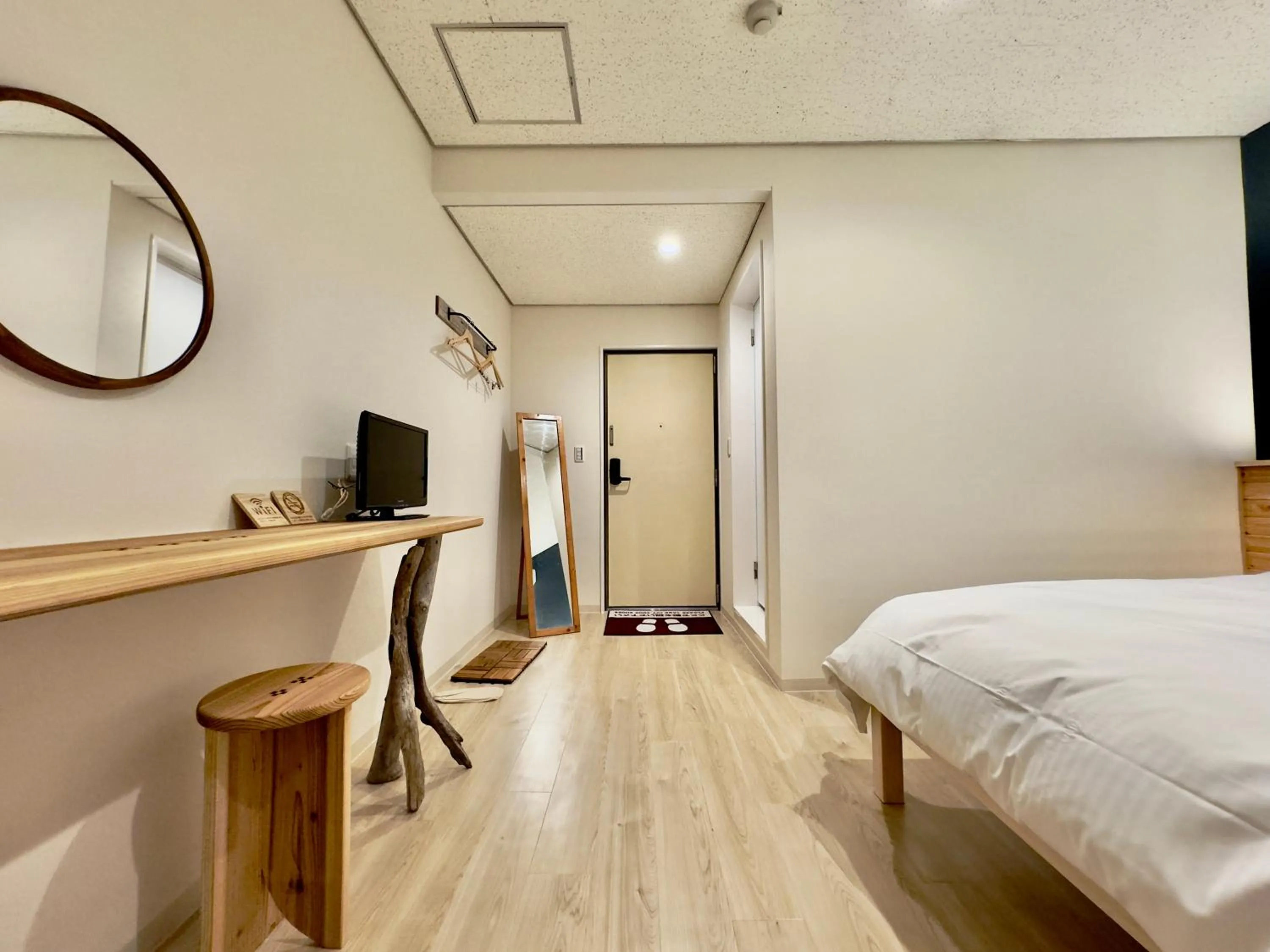 Bed in Hotel Ishigaki and Chikonkiya