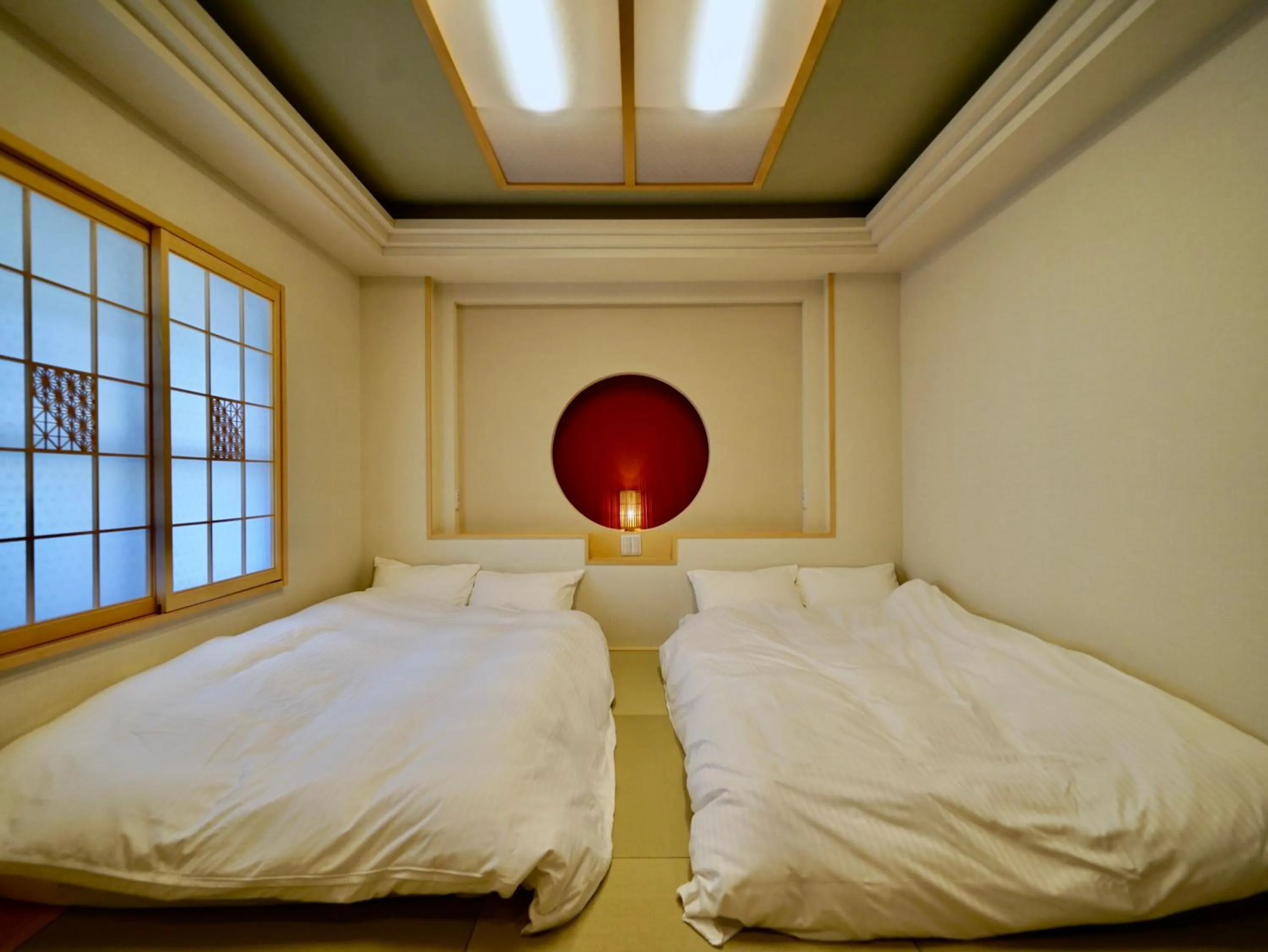 Bed in Hotel Ishigaki and Chikonkiya