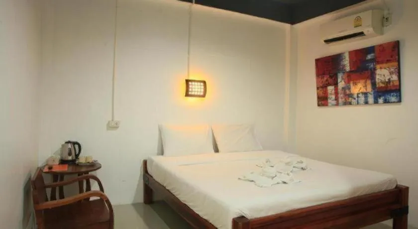 Bed in Hometel Hotel