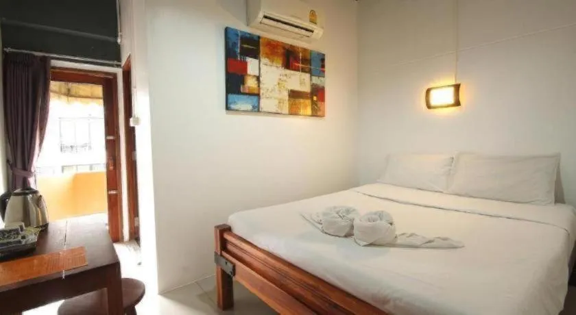 Bed in Hometel Hotel