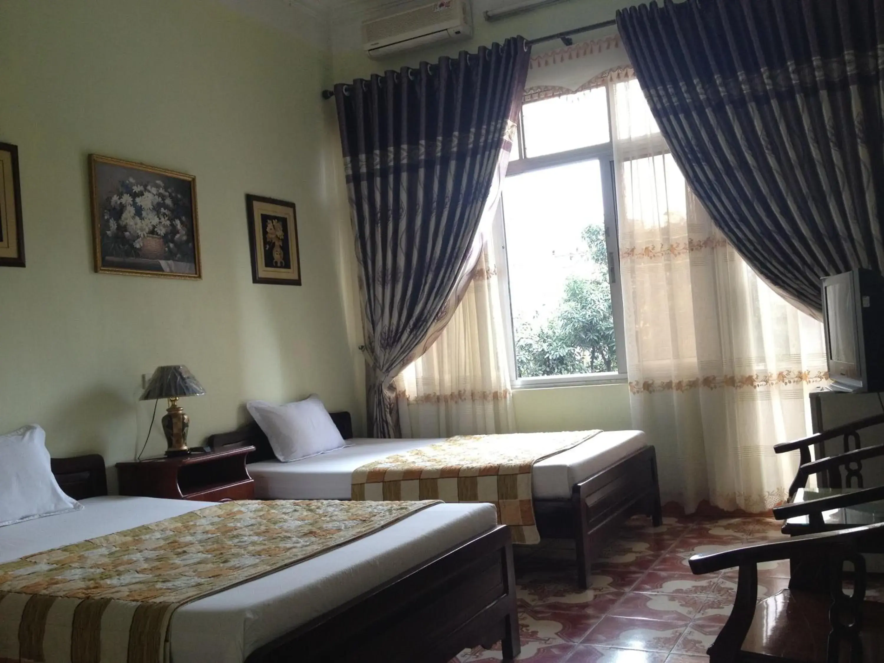 Quadruple Room in Hai Trang Hotel Quadruple Room in Hai Trang Hotel