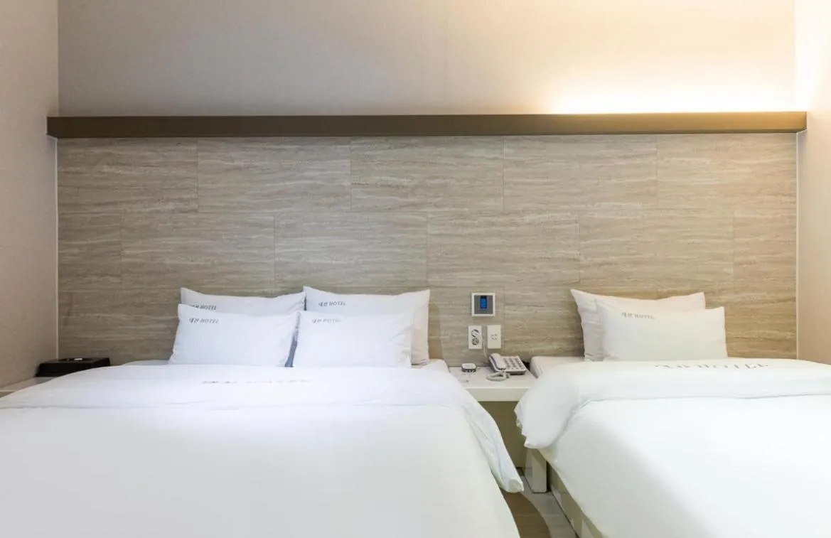 Bed in Daesan Hotel