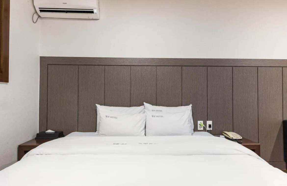 Bed in Daesan Hotel