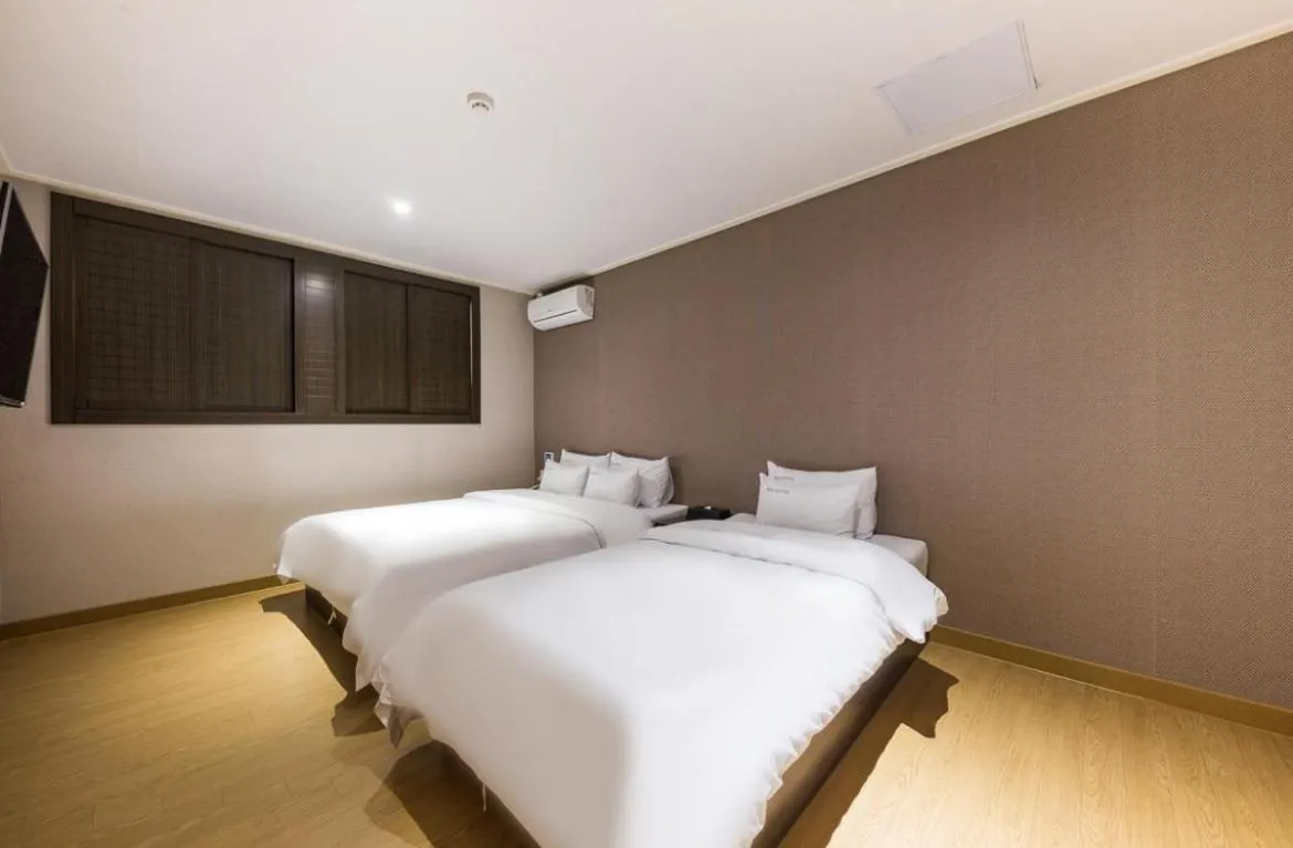 Bed in Daesan Hotel