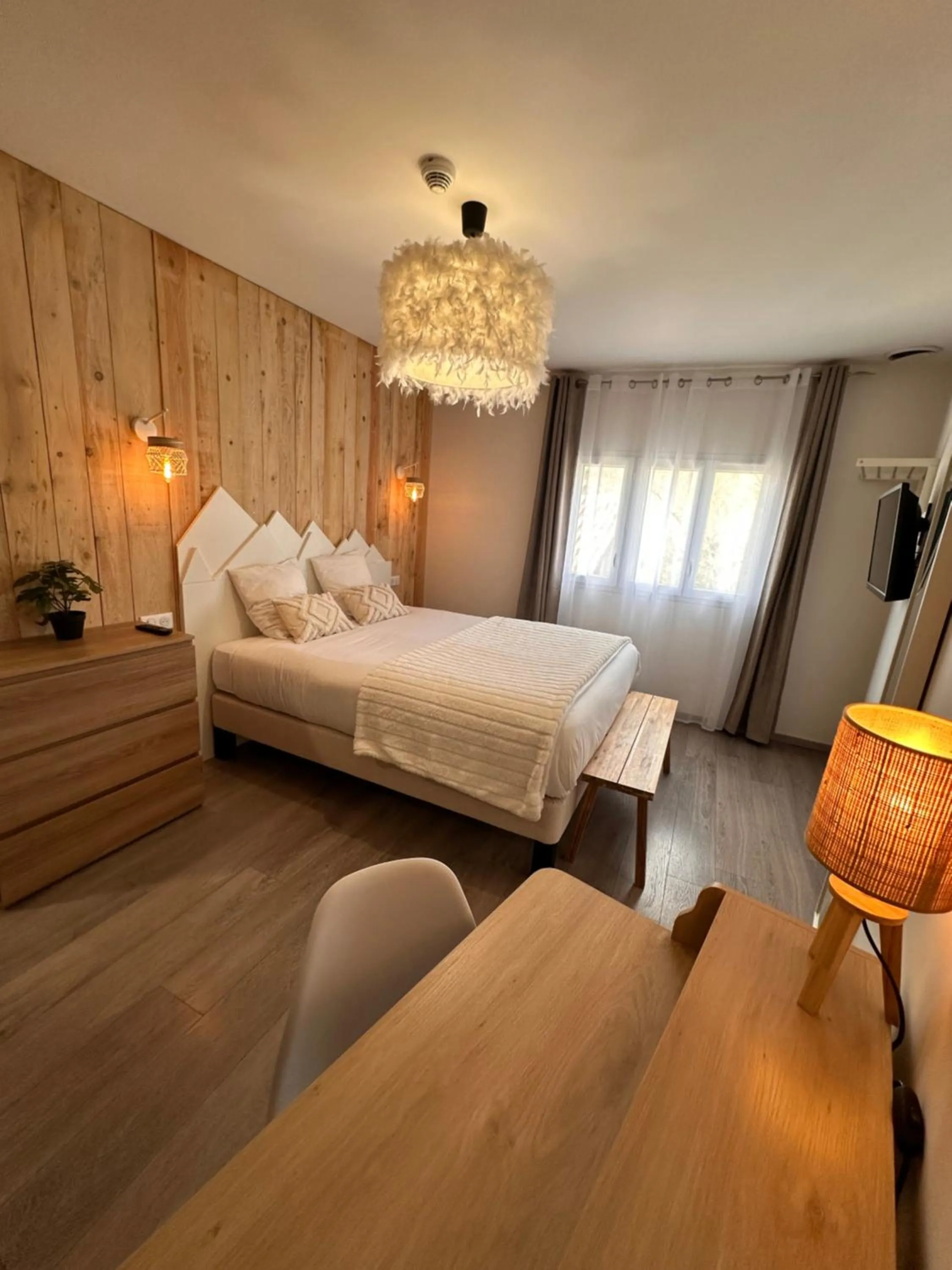 Bed in Auberge du Vieux Lanas Logis Hotel Restaurant