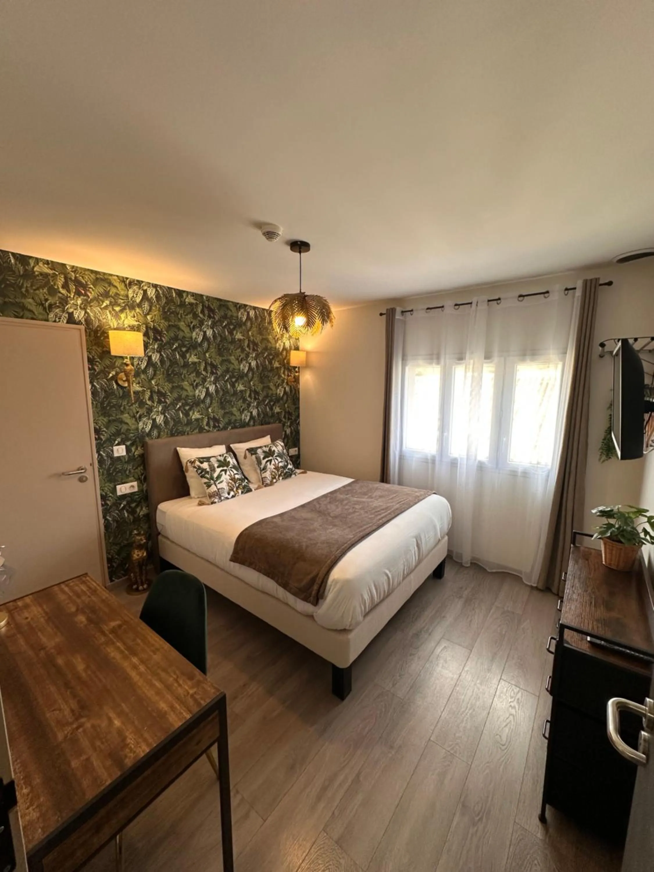 Bed in Auberge du Vieux Lanas Logis Hotel Restaurant