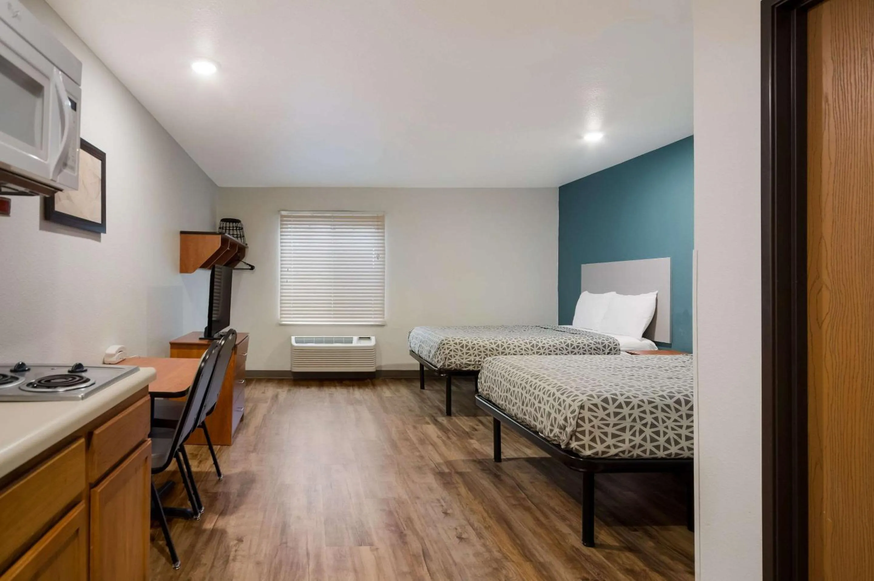 Bedroom, Bed in WoodSpring Suites Johnson City