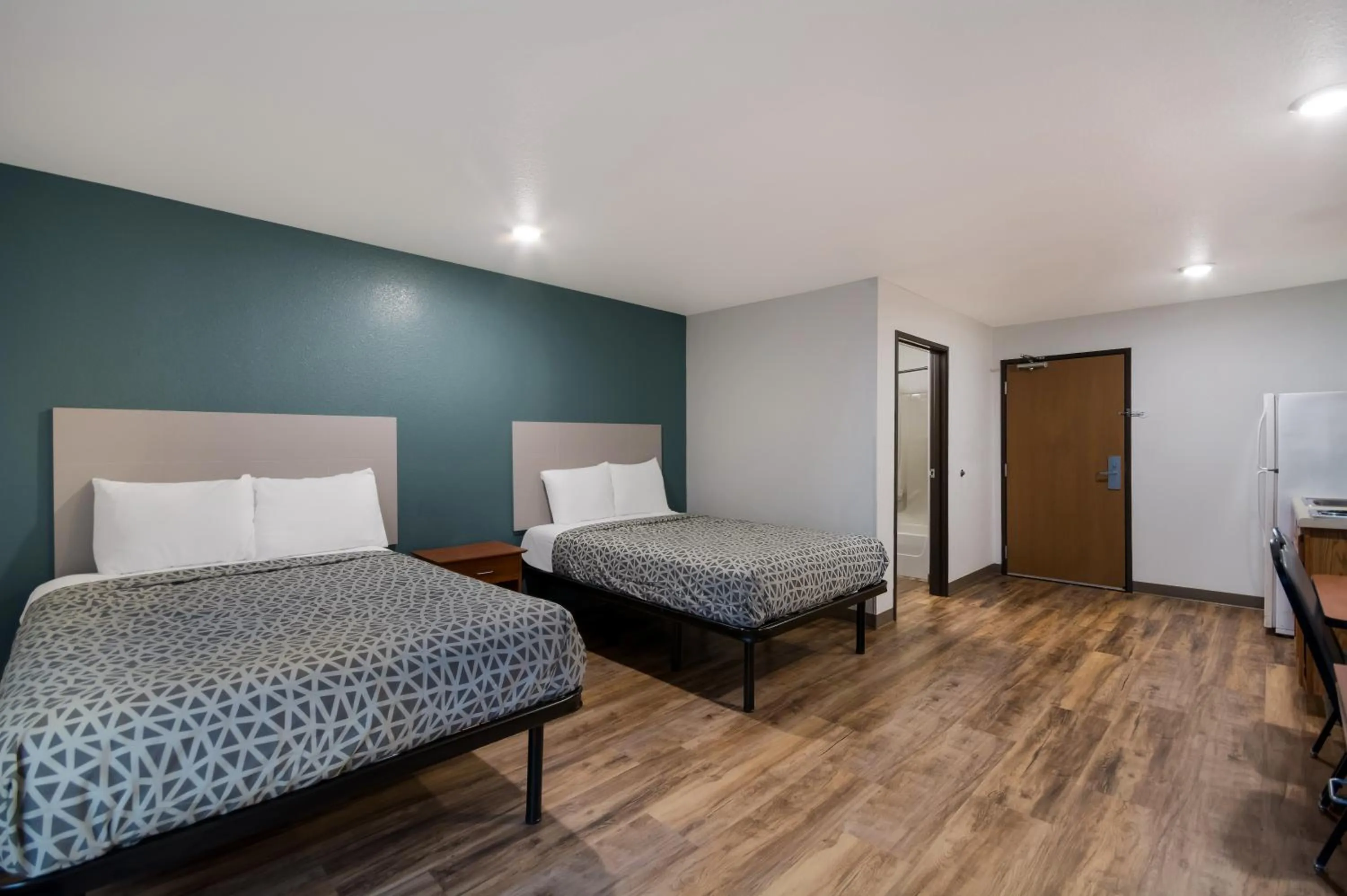 Bedroom, Bed in WoodSpring Suites Macon North