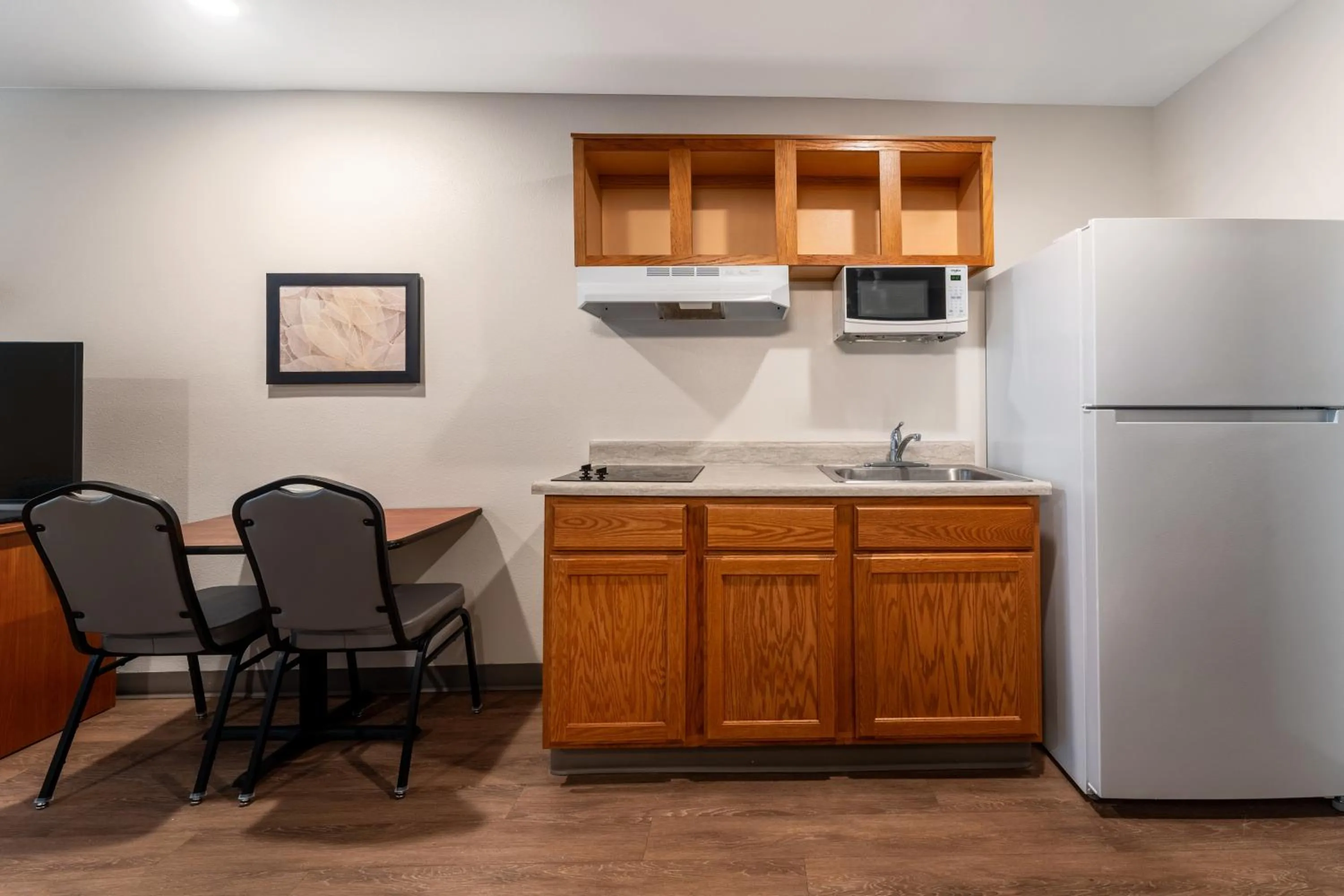 kitchen in WoodSpring Suites Macon North