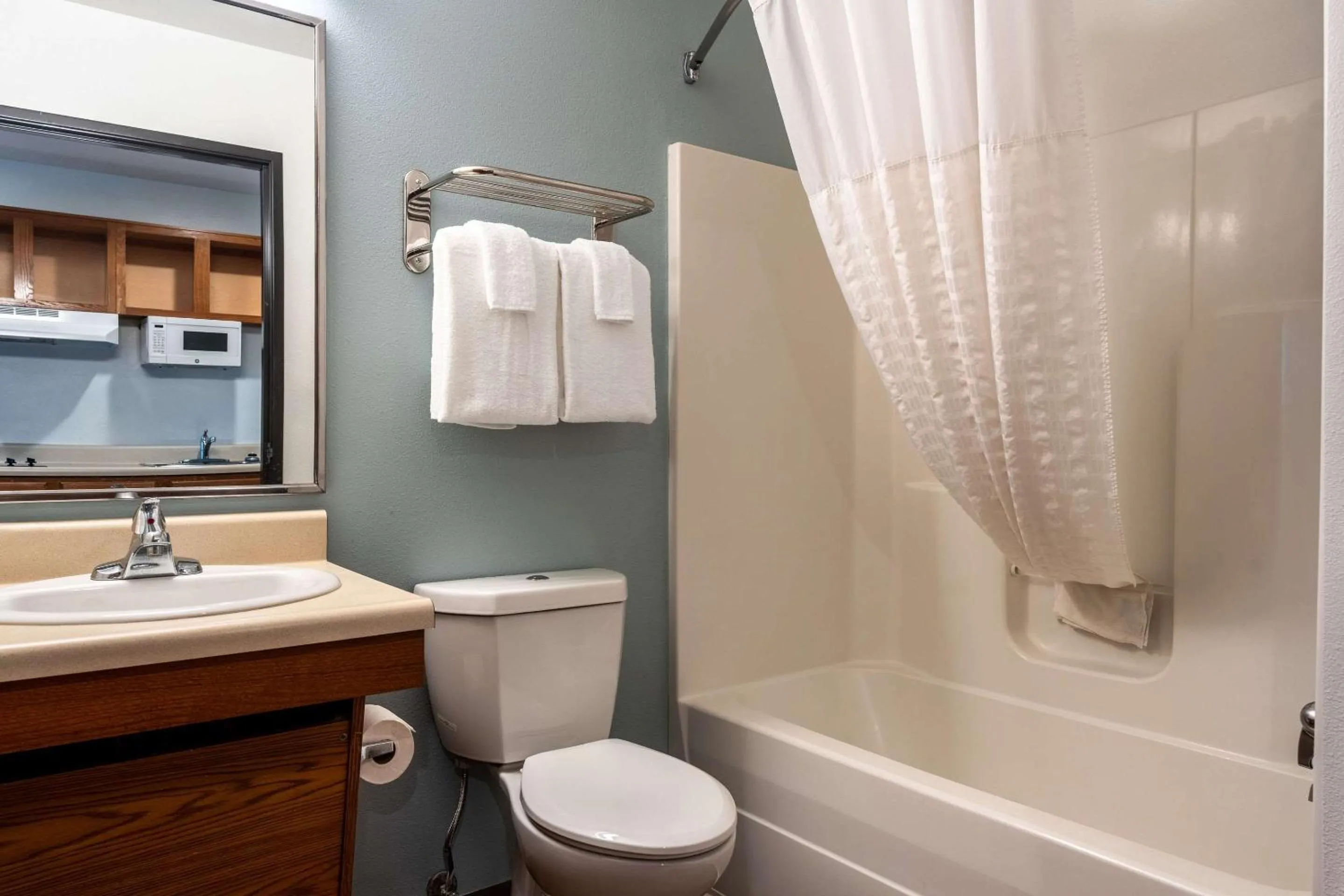 Bedroom in WoodSpring Suites Macon North