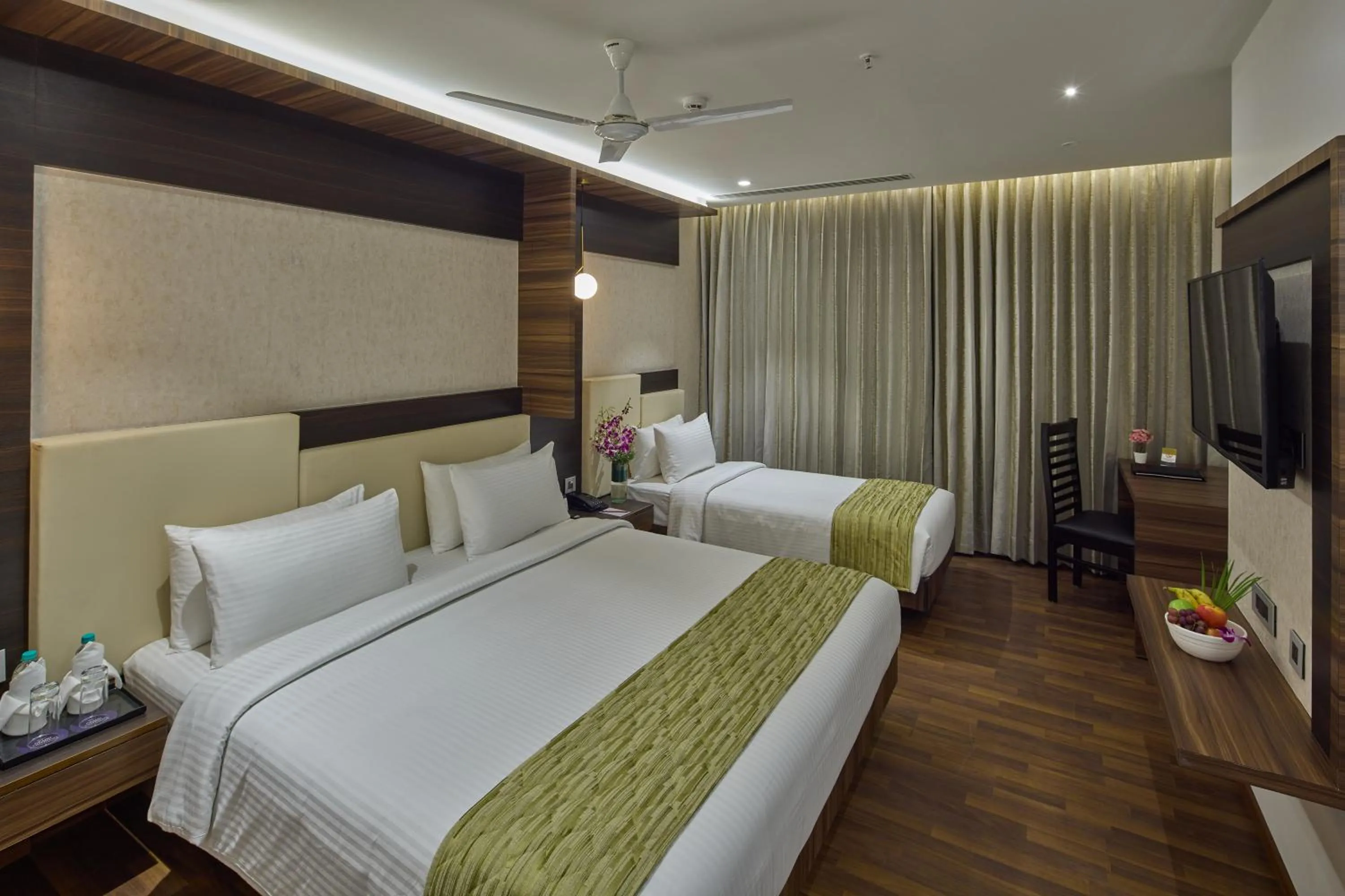 Photo of the whole room, Bed in Grand Continent Hosur A Sarovar Portico Affiliate Hotel