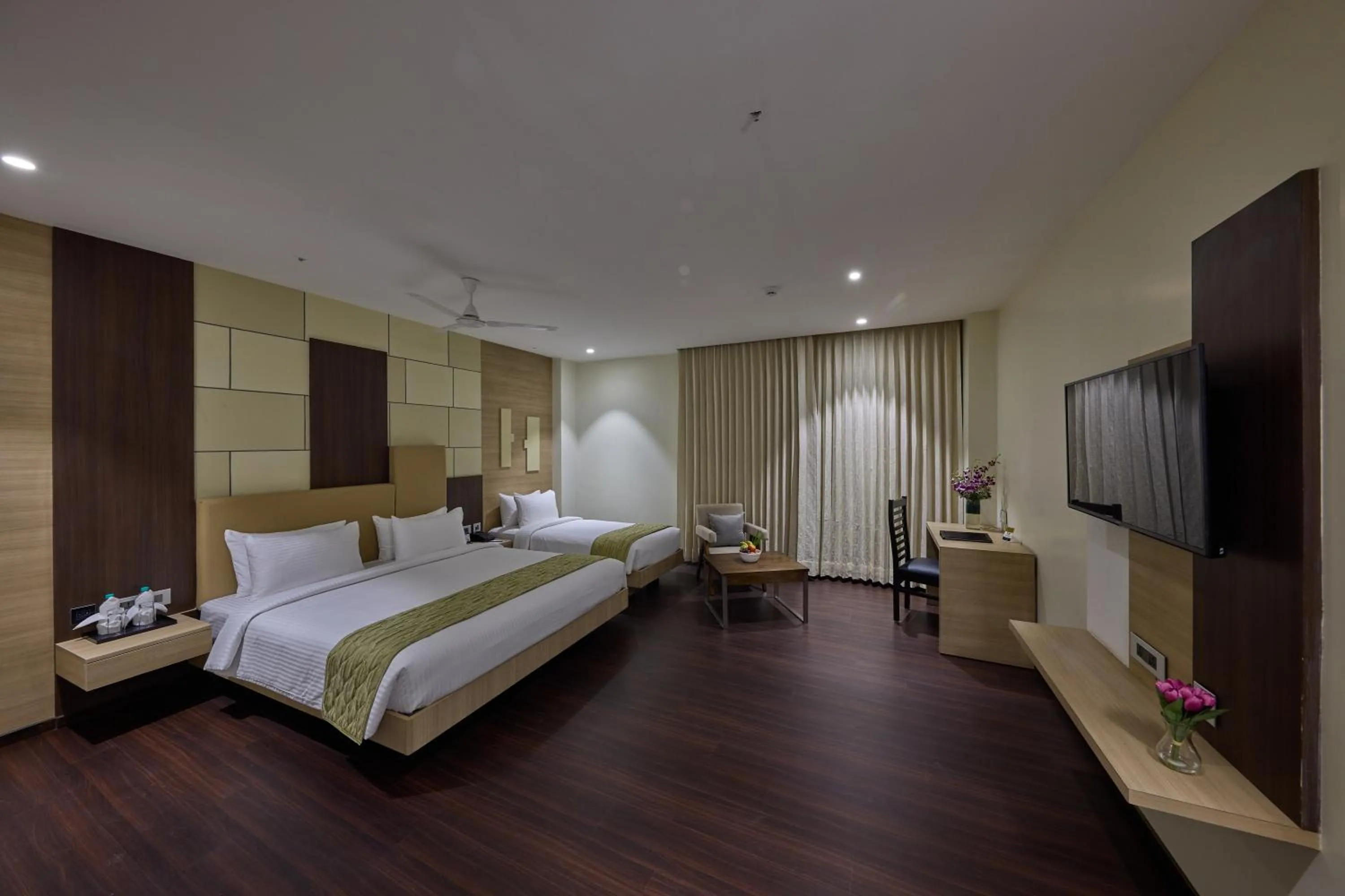 Photo of the whole room, Bed in Grand Continent Hosur A Sarovar Portico Affiliate Hotel