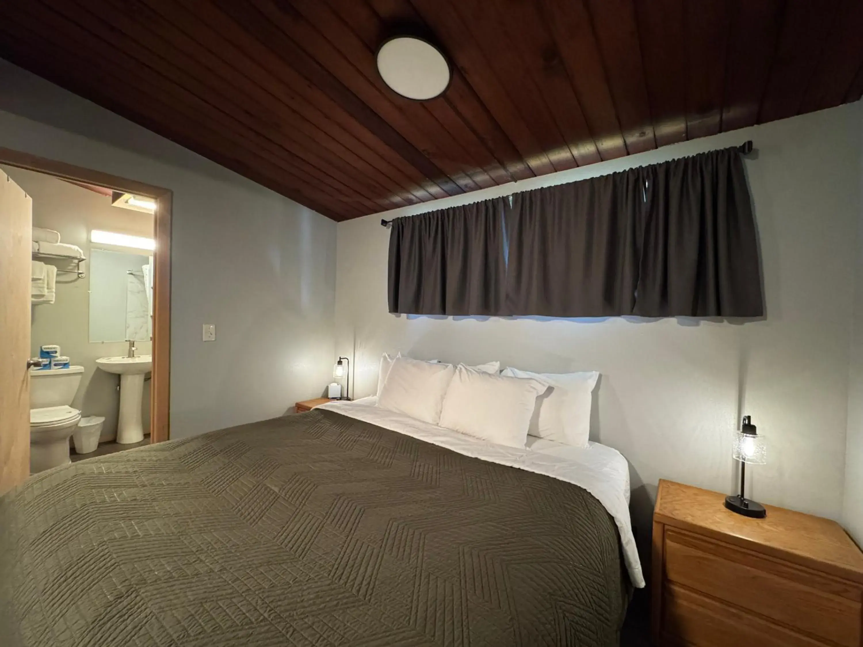 Bed in The Pioneer Motel Bed in The Pioneer Motel