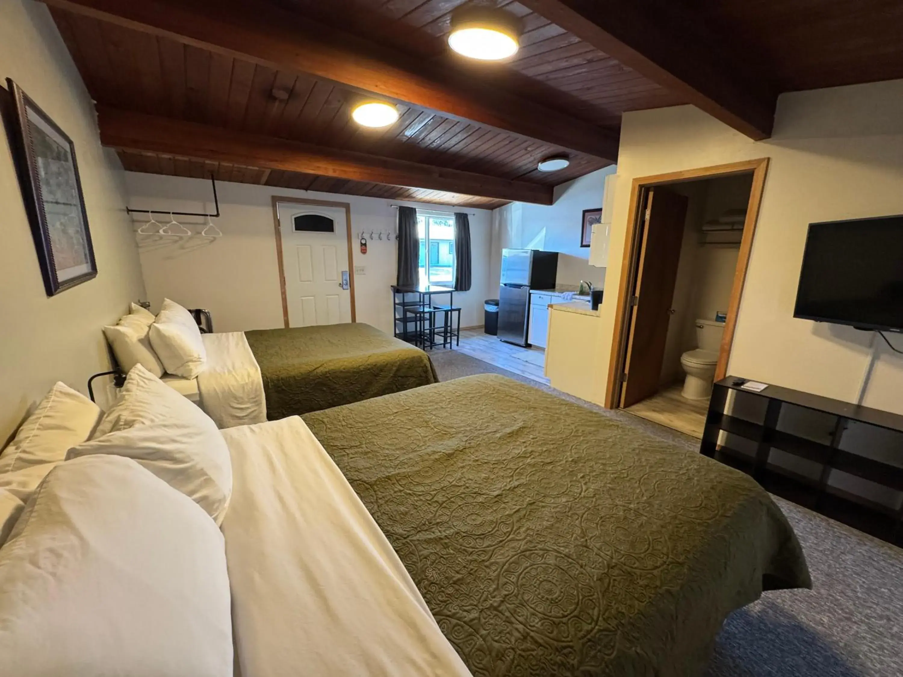 Bed in The Pioneer Motel Bed in The Pioneer Motel