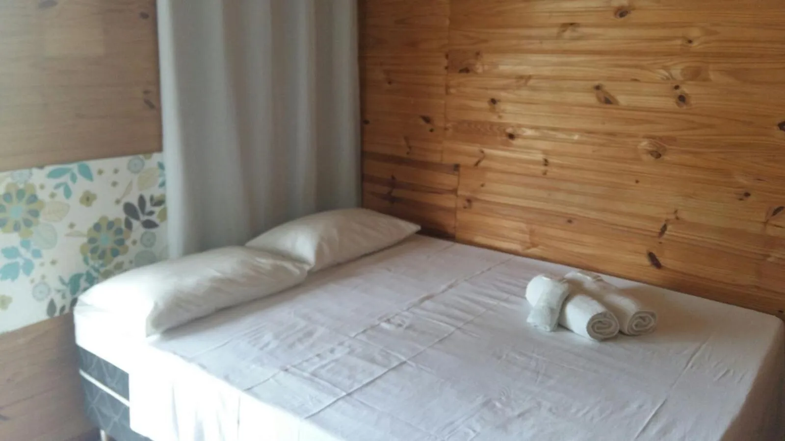 Bed in Pousada Casa de Madeira