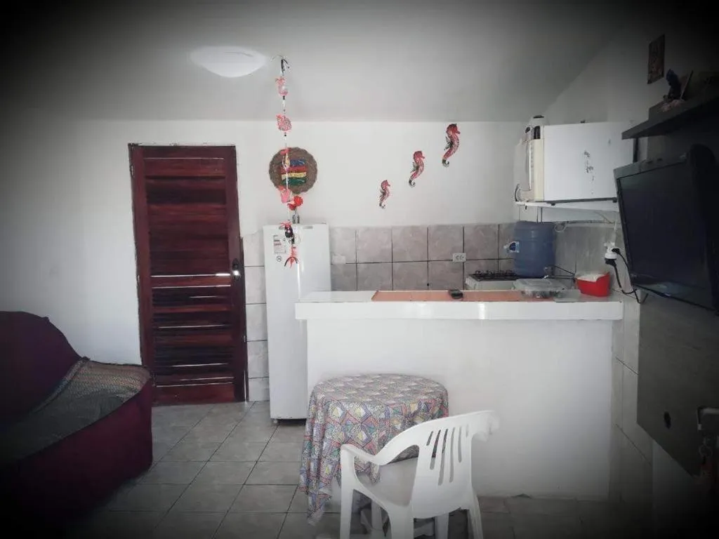 Kitchen or kitchenette in Pousada Casa de Madeira