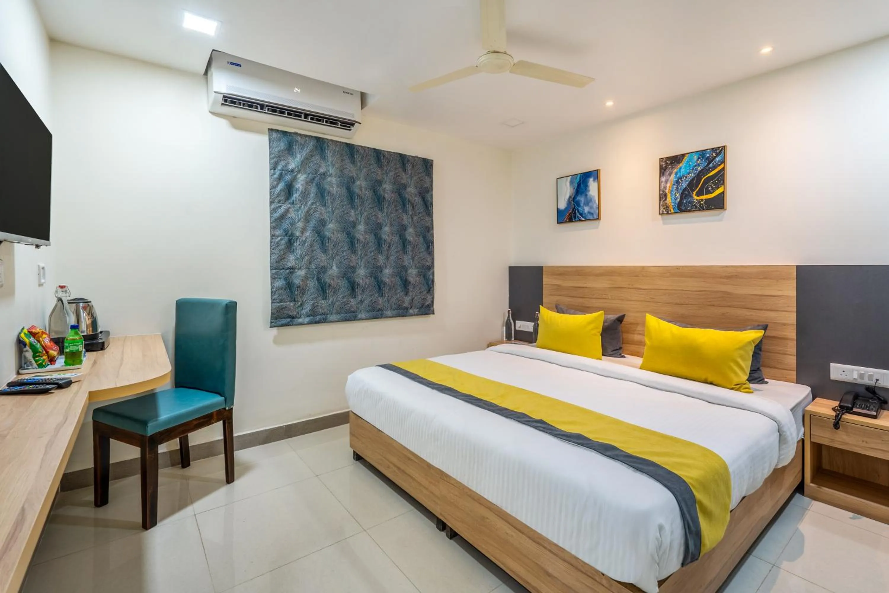 Bed in Eminent Suites and Apartments