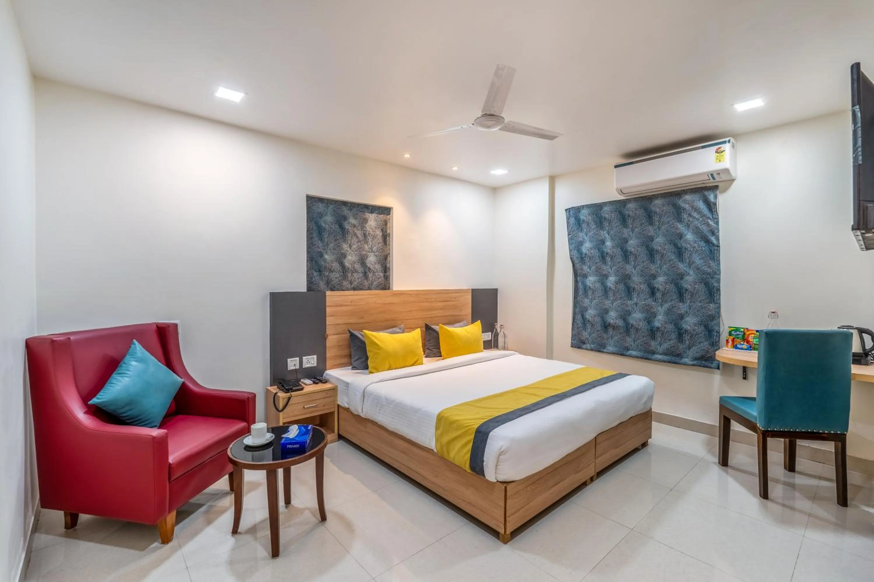 Bed in Eminent Suites and Apartments