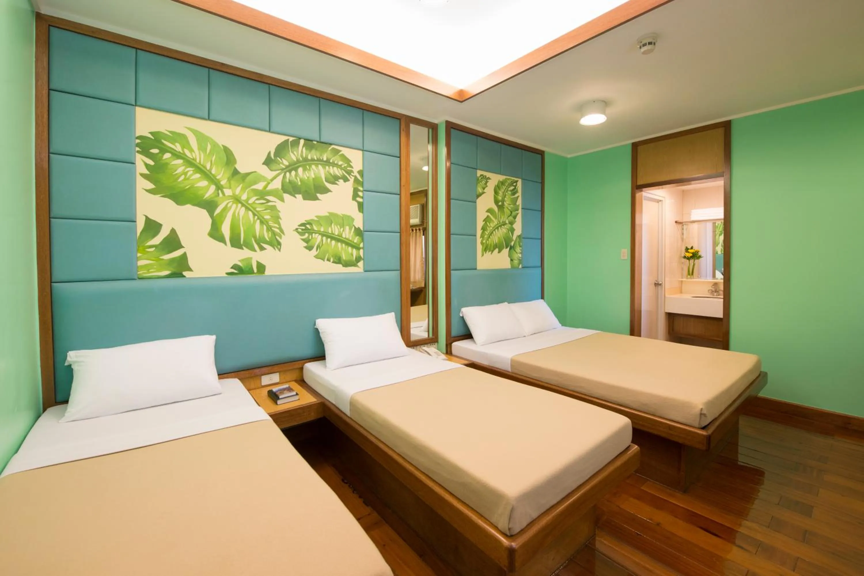 Bedroom, Bed in Kabayan Hotel Pasay