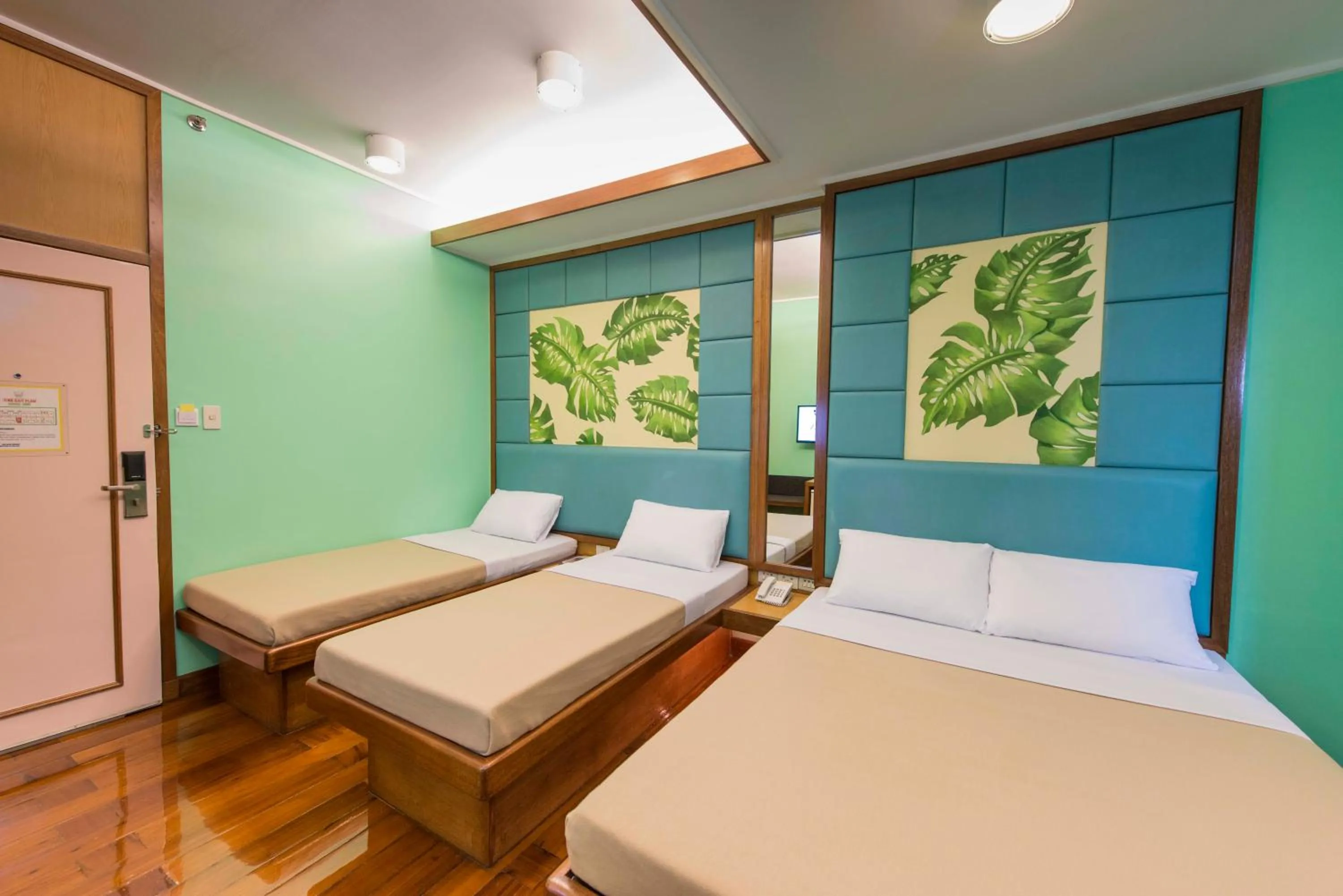 Bedroom, Bed in Kabayan Hotel Pasay